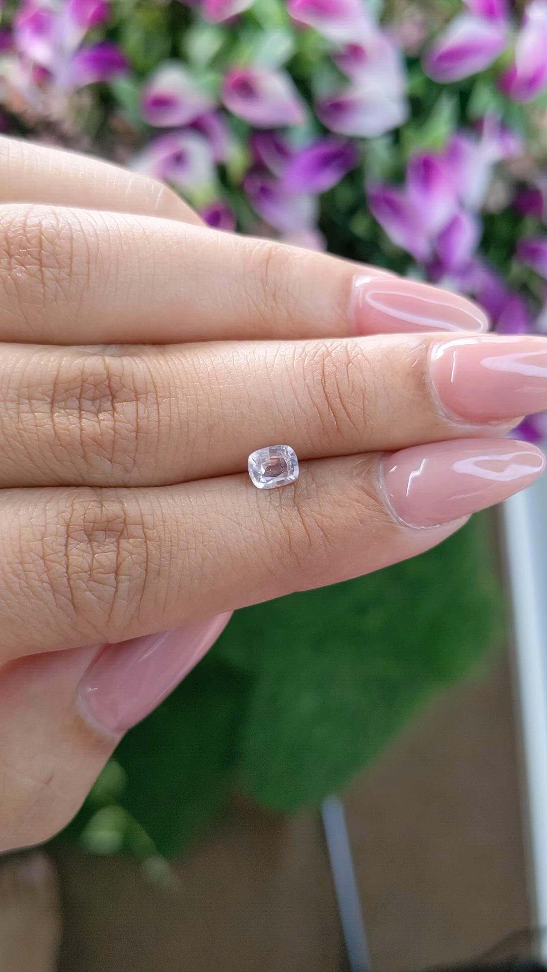 0.55 Ct. Peach Sapphire from Ceylon (Sri Lanka) Size Video