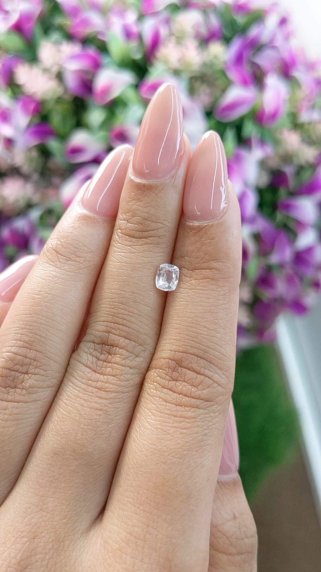 0.55 Ct. Peach Sapphire from Ceylon (Sri Lanka) Size Video