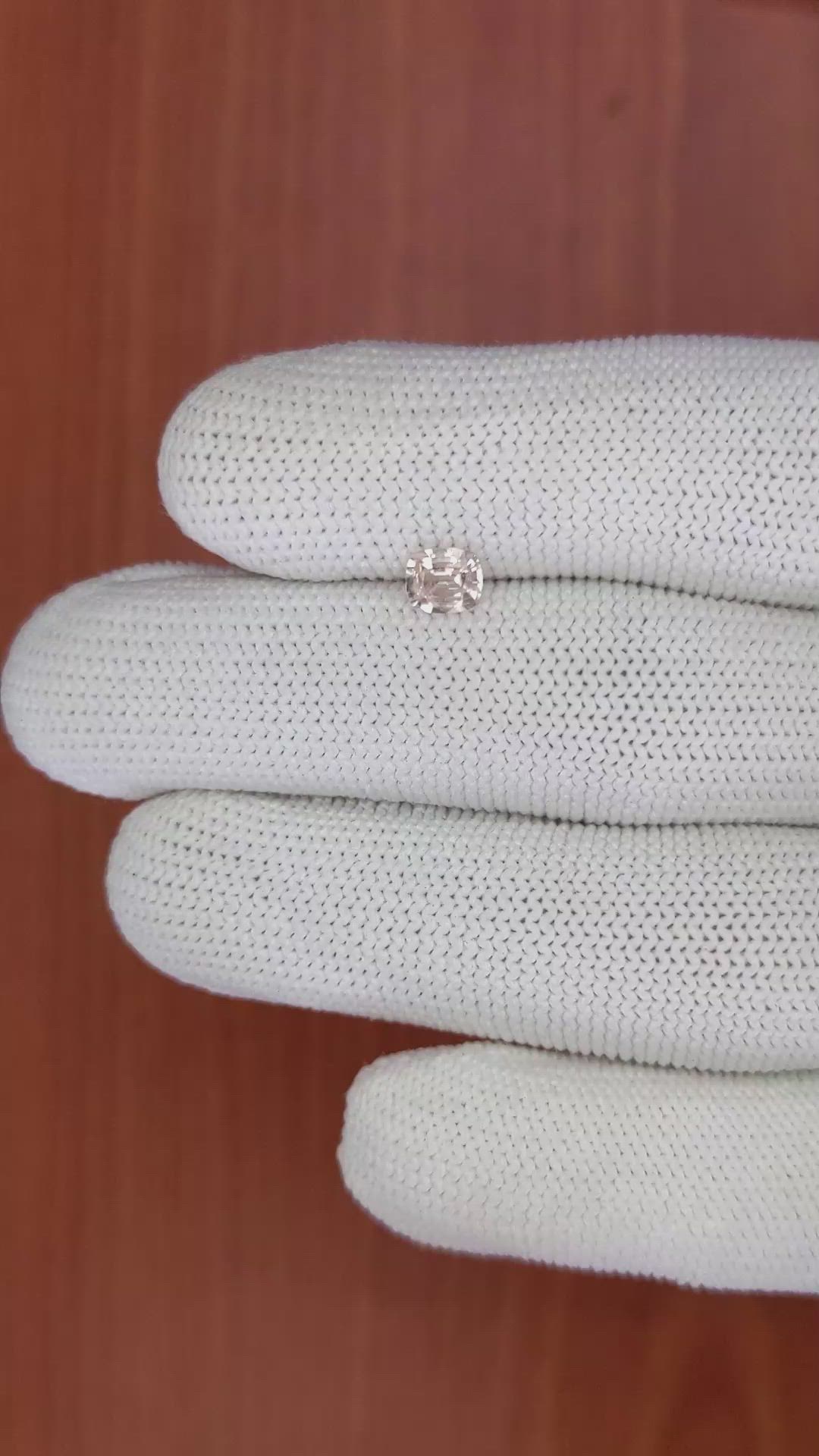 0.55 Ct. Peach Sapphire from Ceylon (Sri Lanka) Size Video
