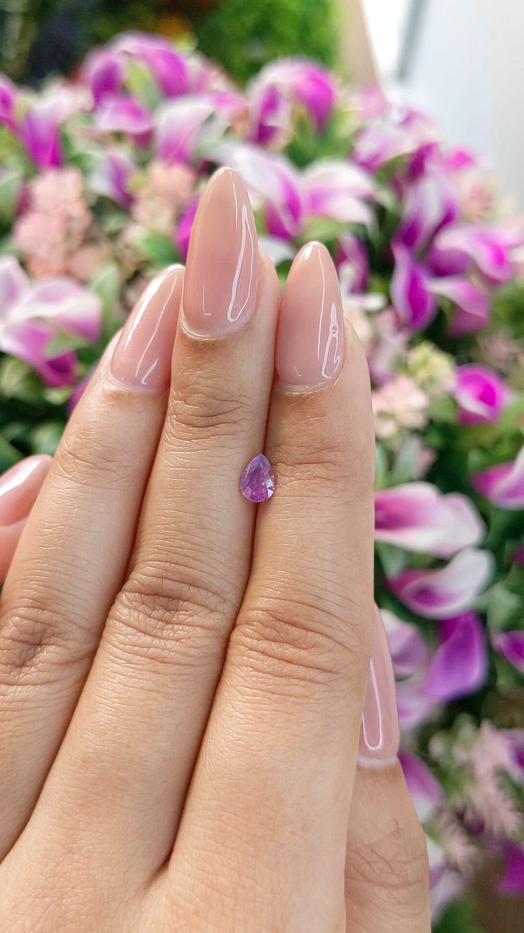 0.45 Ct. Purplish Pink Sapphire from Ceylon (Sri Lanka) Size Video