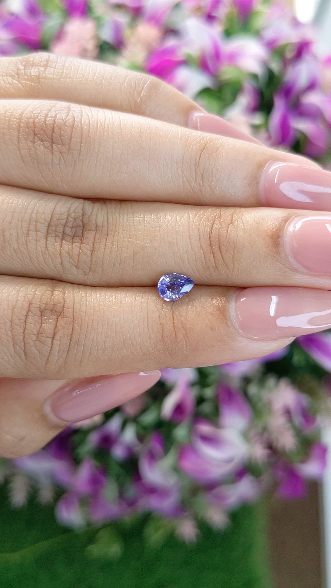 0.59 Ct. Violet Sapphire from Ceylon (Sri Lanka) Size Video