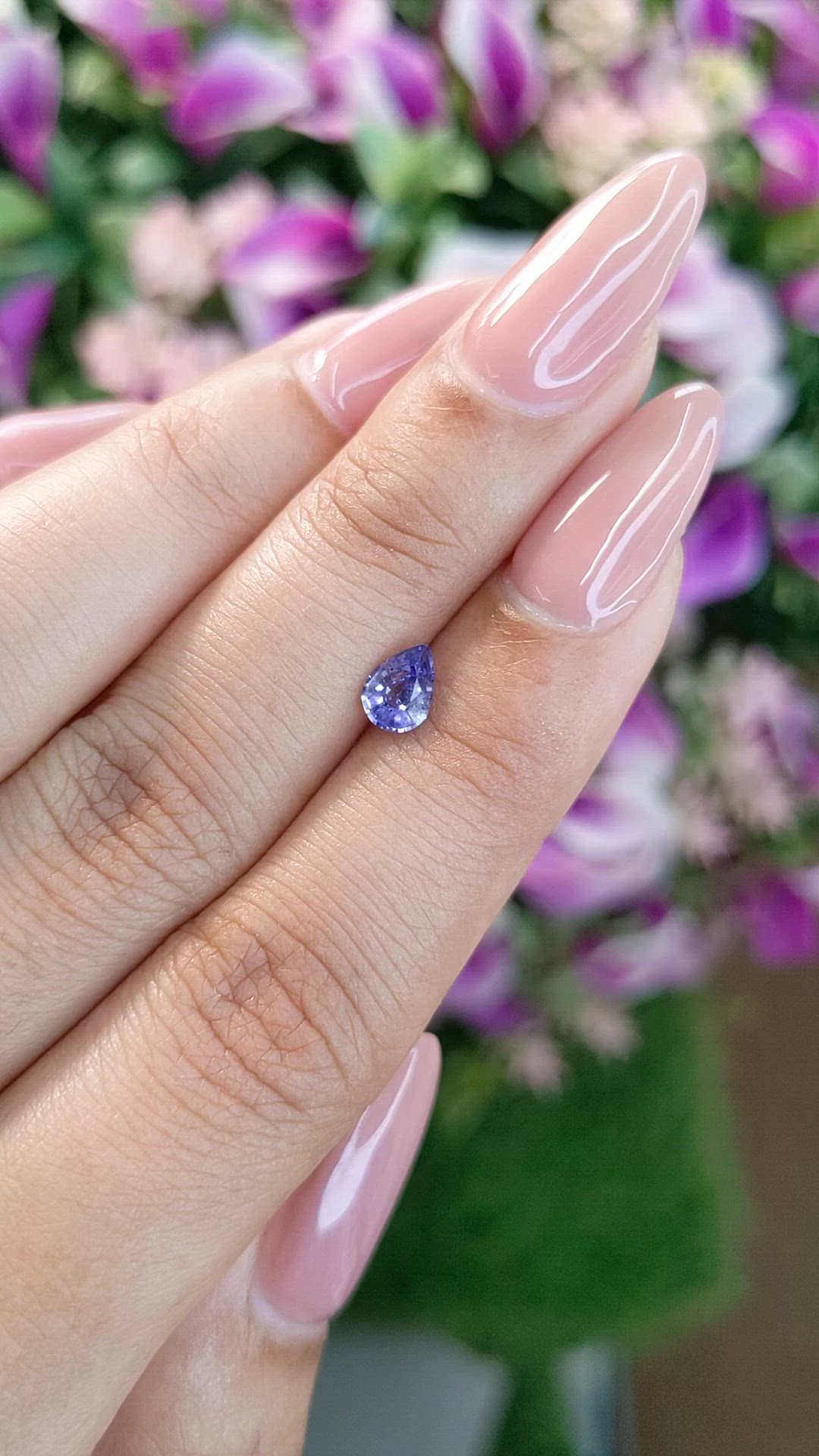 0.59 Ct. Violet Sapphire from Ceylon (Sri Lanka) Size Video