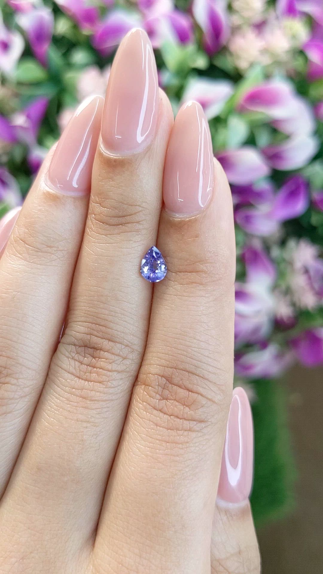 0.59 Ct. Violet Sapphire from Ceylon (Sri Lanka) Size Video