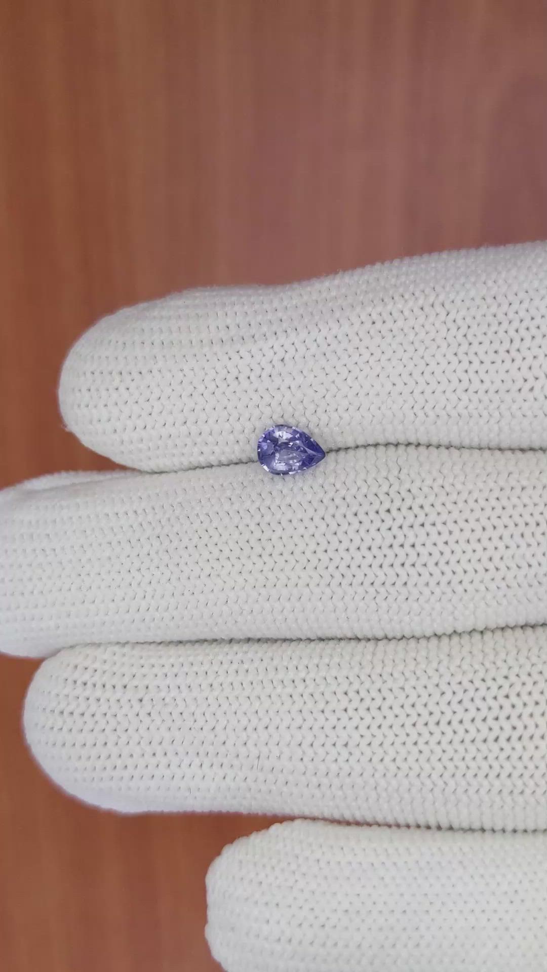 0.59 Ct. Violet Sapphire from Ceylon (Sri Lanka) Size Video