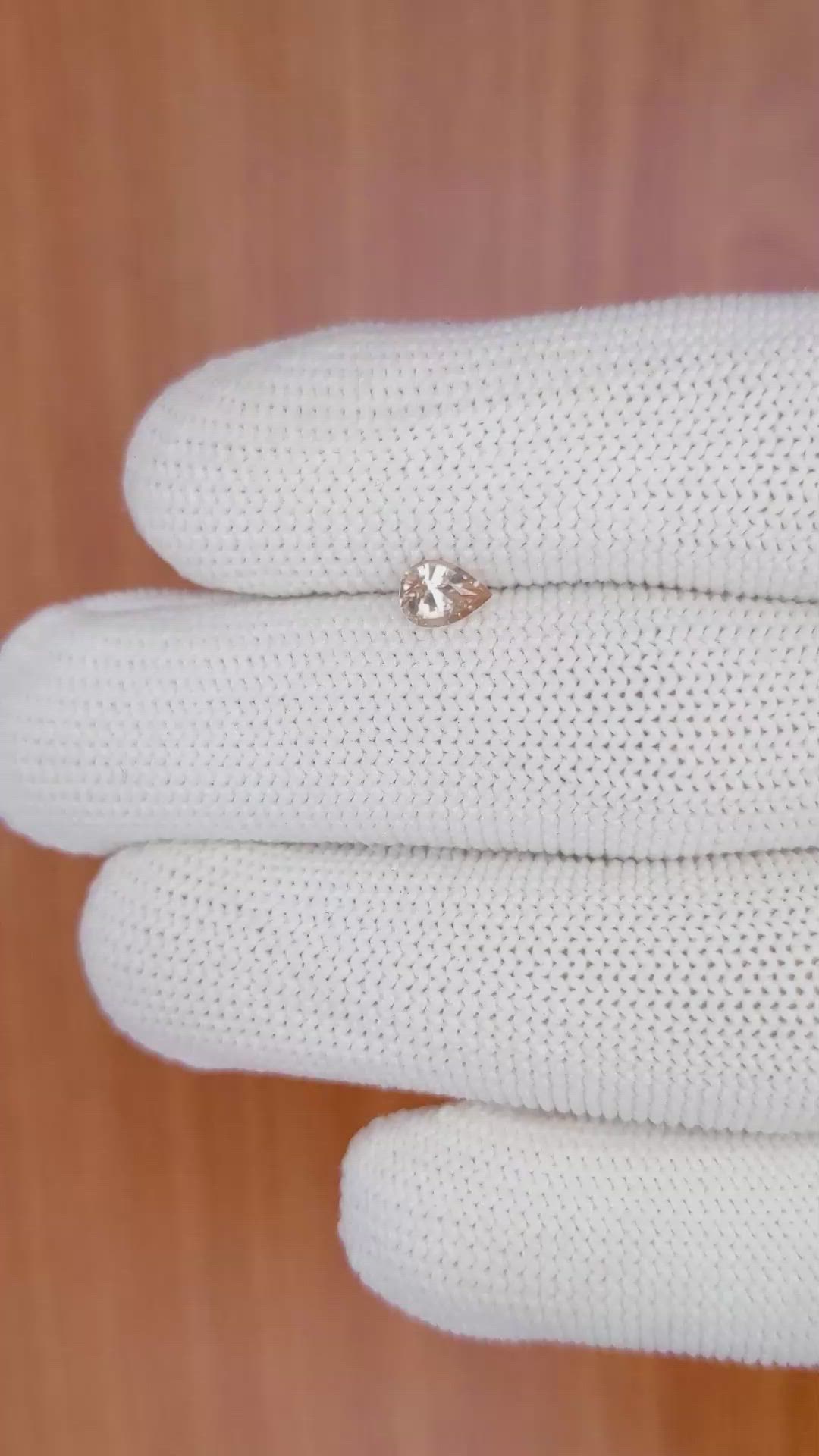 0.57 Ct. Peach Sapphire from Ceylon (Sri Lanka) Size Video