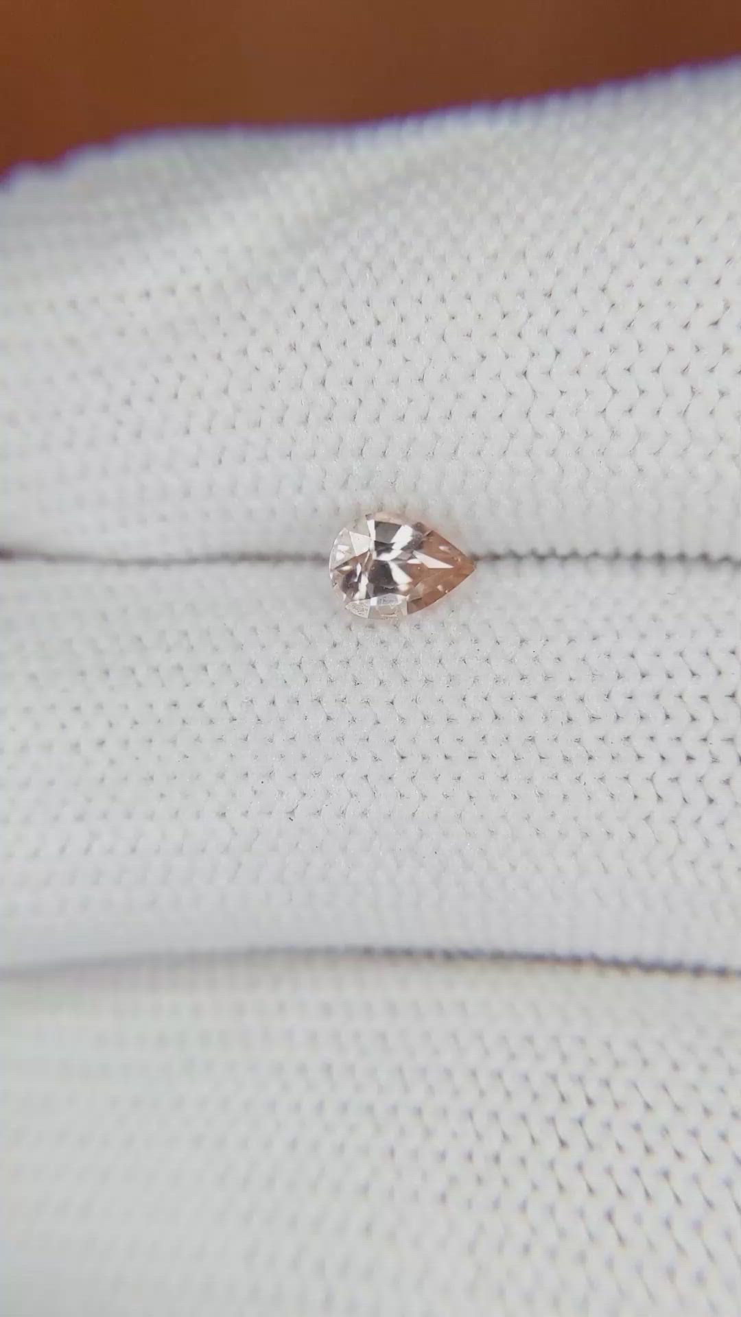 0.57 Ct. Peach Sapphire from Ceylon (Sri Lanka) Size Video