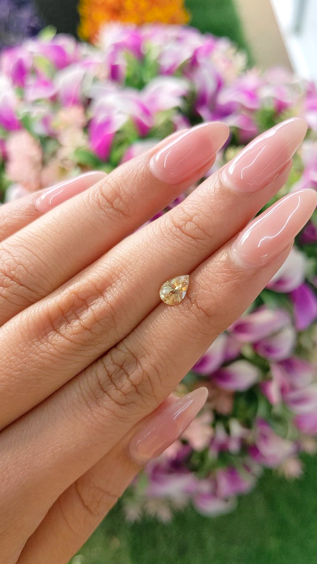 0.88 Ct. Peach Sapphire from Ceylon (Sri Lanka) Size Video