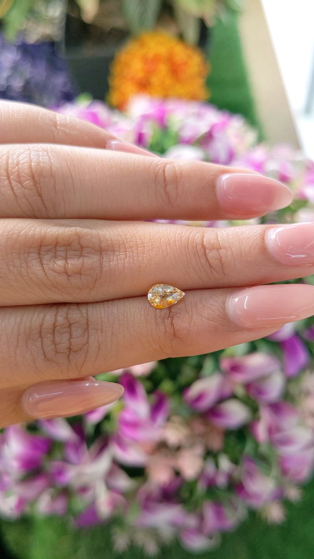 0.88 Ct. Peach Sapphire from Ceylon (Sri Lanka) Size Video