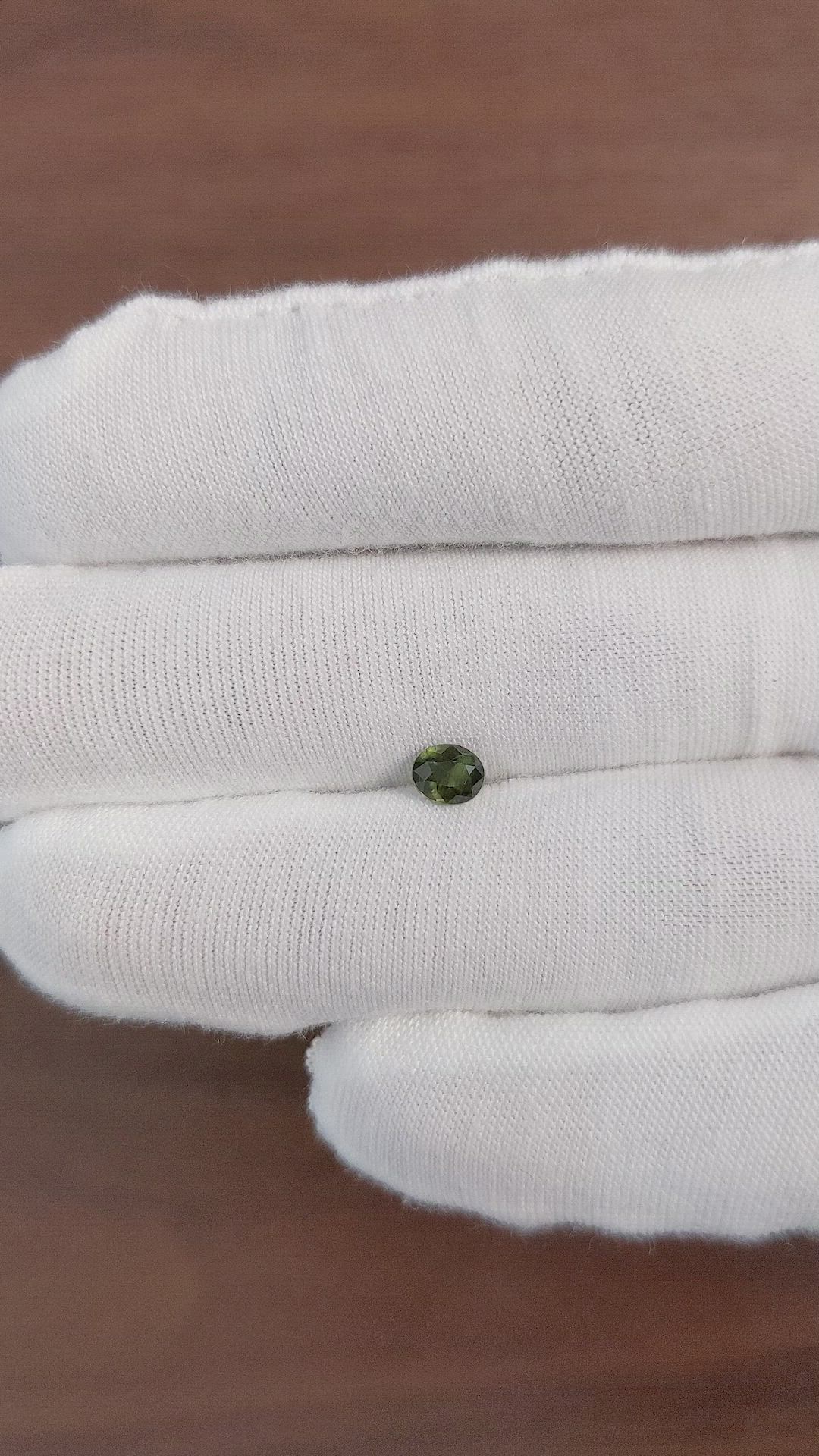 0.53 Ct. Green Sapphire from Africa Size Video
