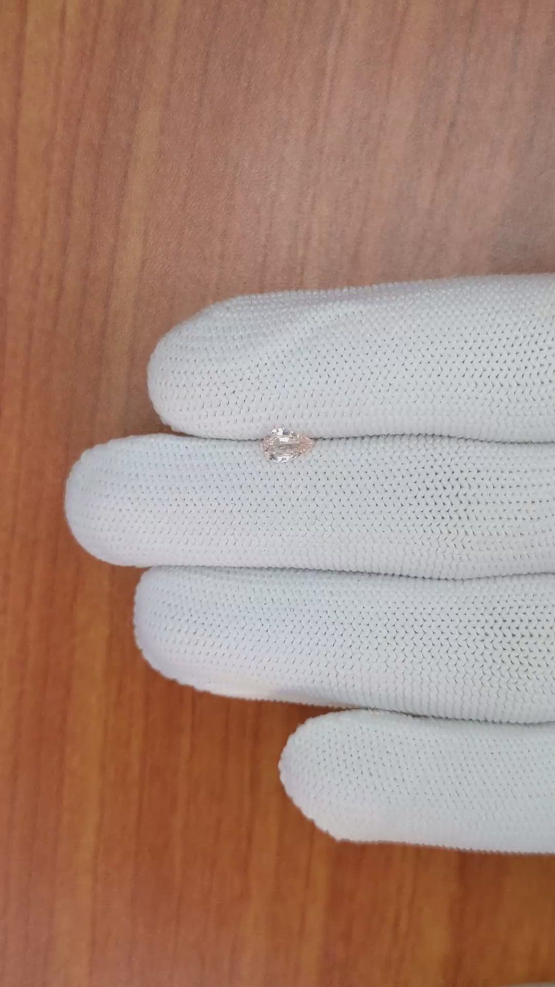 0.50 Ct. Peach Sapphire from Ceylon (Sri Lanka) Size Video