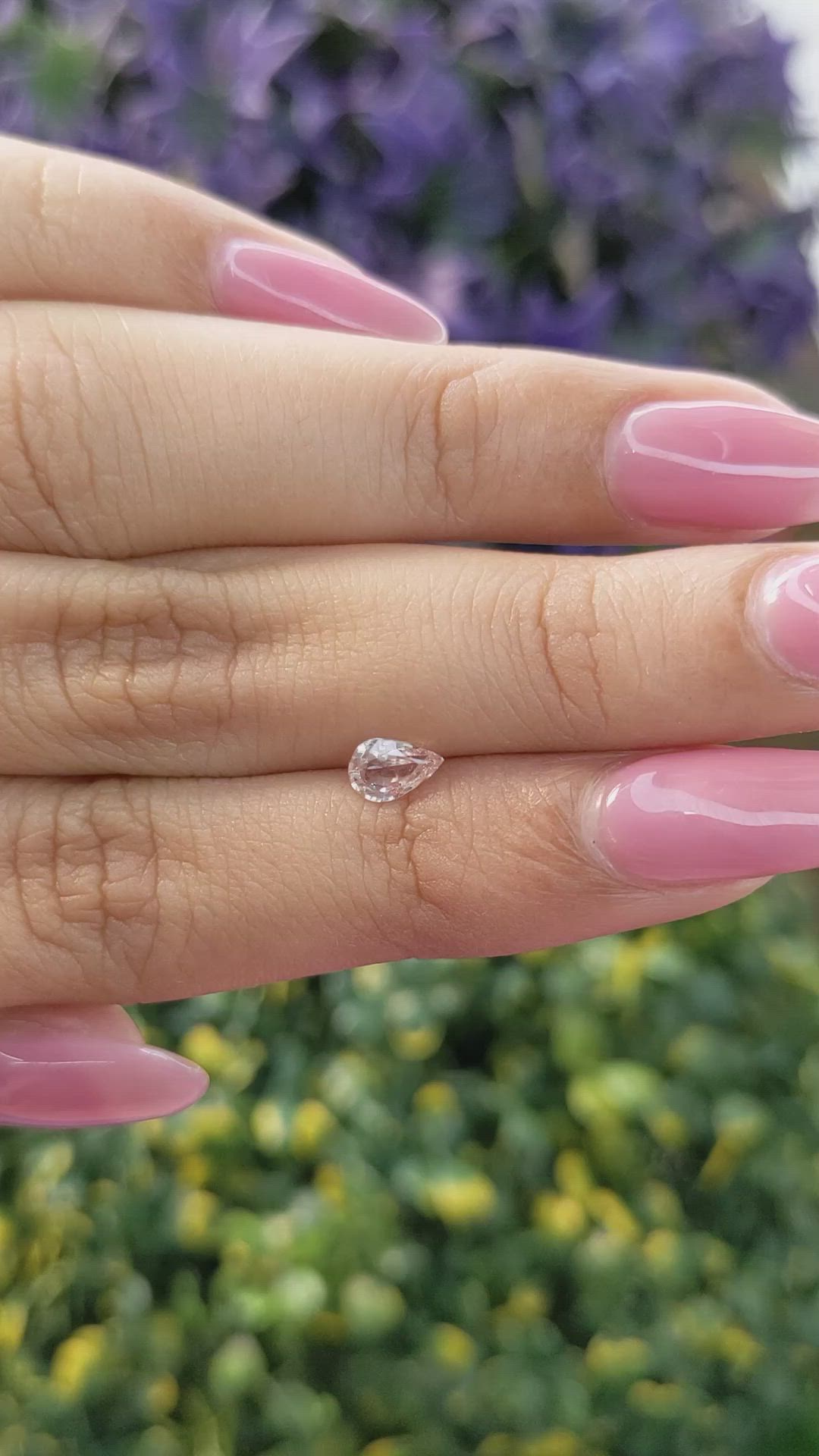 0.50 Ct. Peach Sapphire from Ceylon (Sri Lanka) Size Video