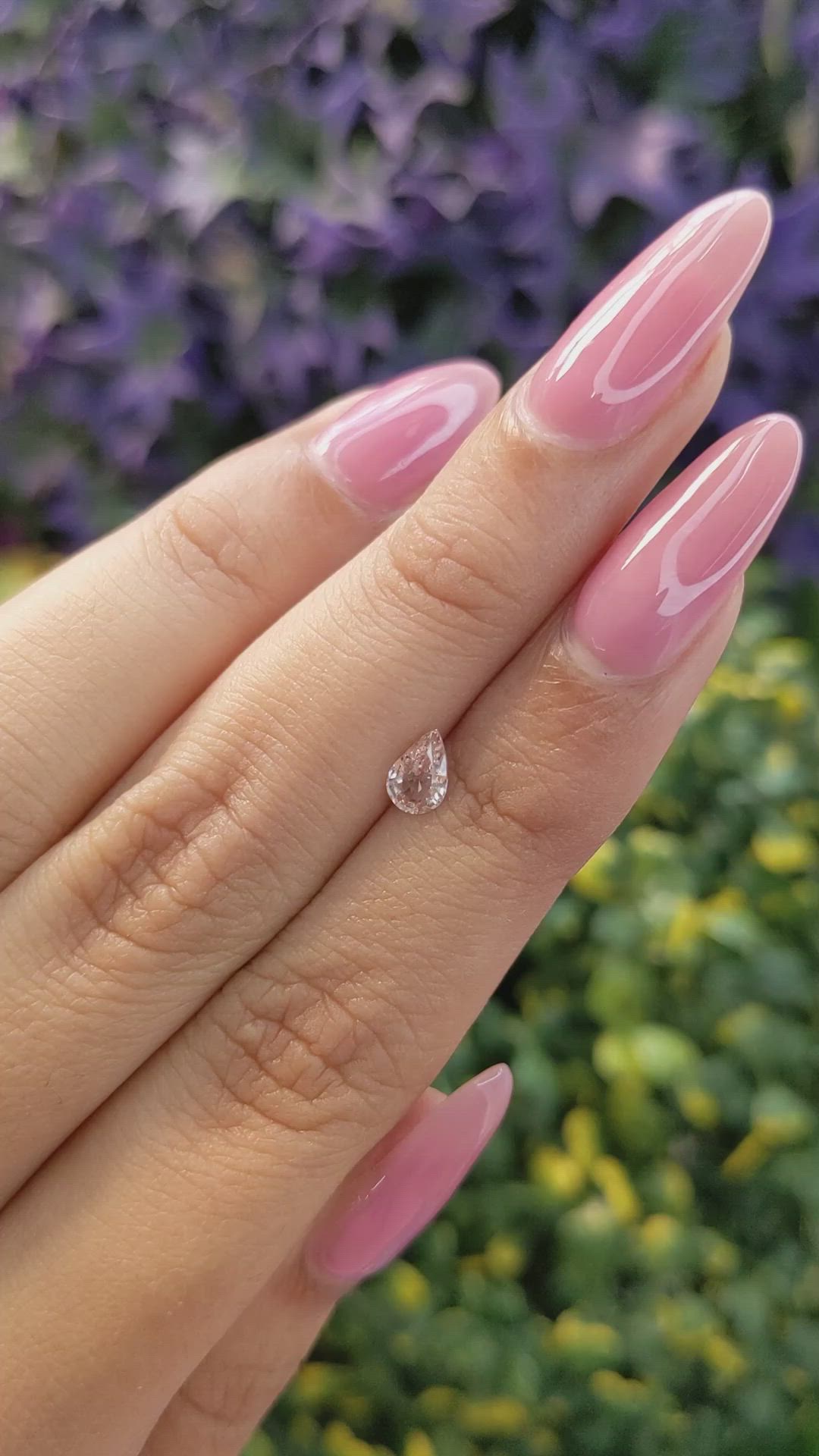 0.50 Ct. Peach Sapphire from Ceylon (Sri Lanka) Size Video