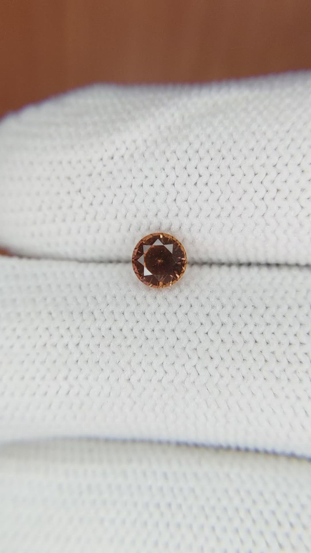 0.68 Ct. Orange Sapphire from Ceylon (Sri Lanka) Size Video
