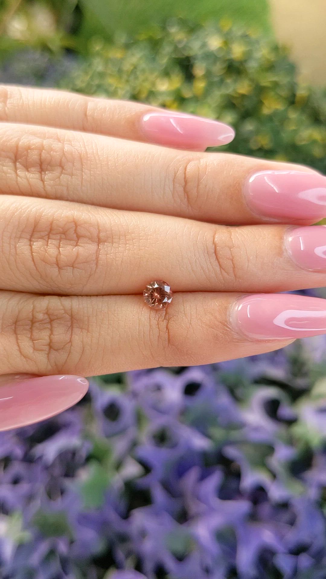 0.68 Ct. Orange Sapphire from Ceylon (Sri Lanka) Size Video
