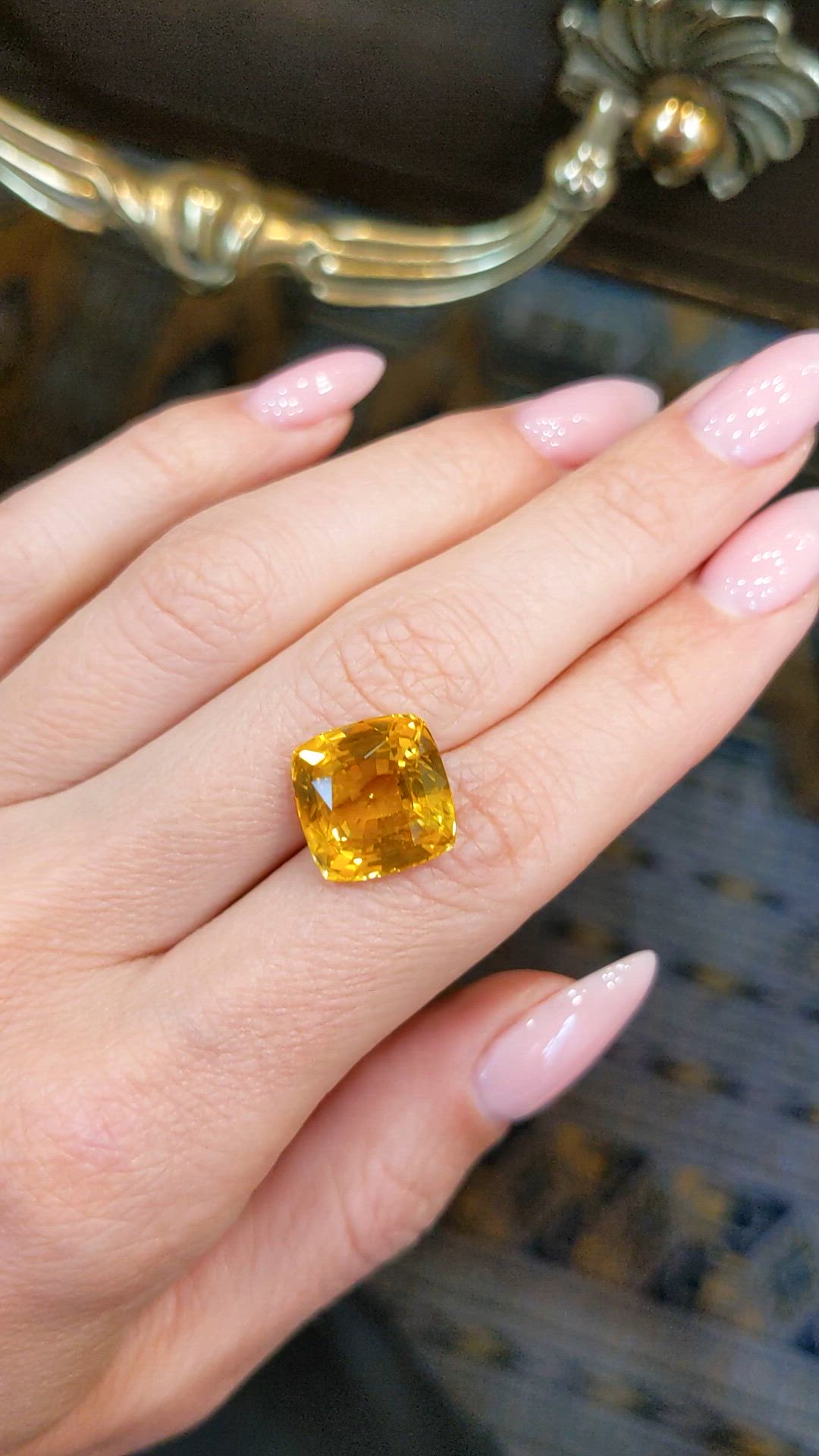 12.26 Ct. Orangish Yellow Sapphire from Ceylon (Sri Lanka) Size Video