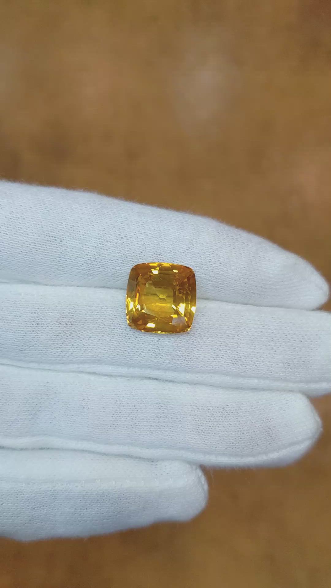 12.26 Ct. Orangish Yellow Sapphire from Ceylon (Sri Lanka) Size Video