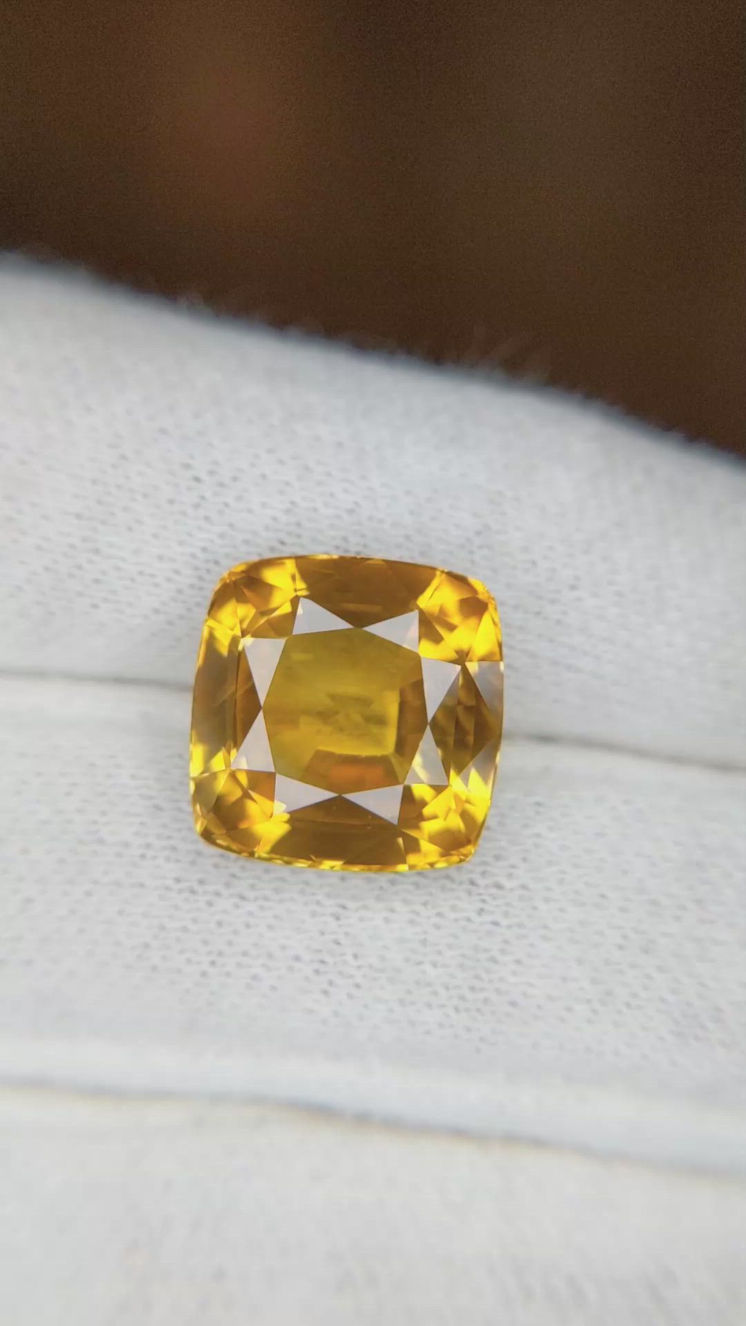 12.26 Ct. Orangish Yellow Sapphire from Ceylon (Sri Lanka) Size Video