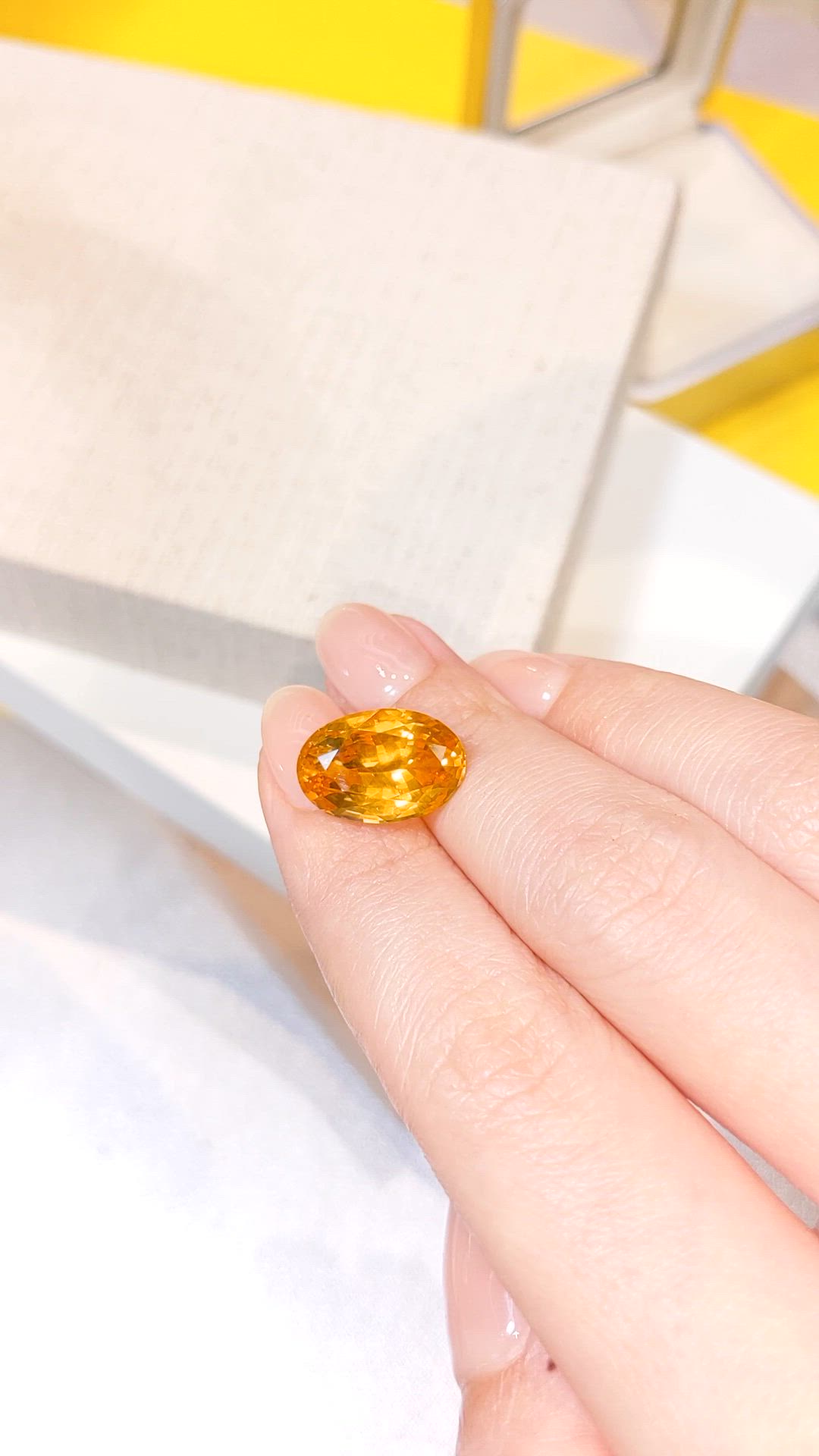 10.90 Ct. Orange Sapphire from Ceylon (Sri Lanka) Size Video