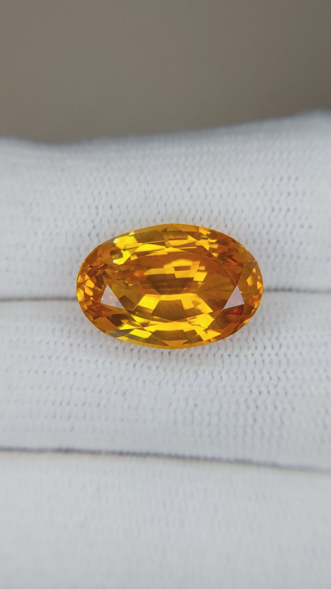 10.90 Ct. Orange Sapphire from Ceylon (Sri Lanka) Size Video