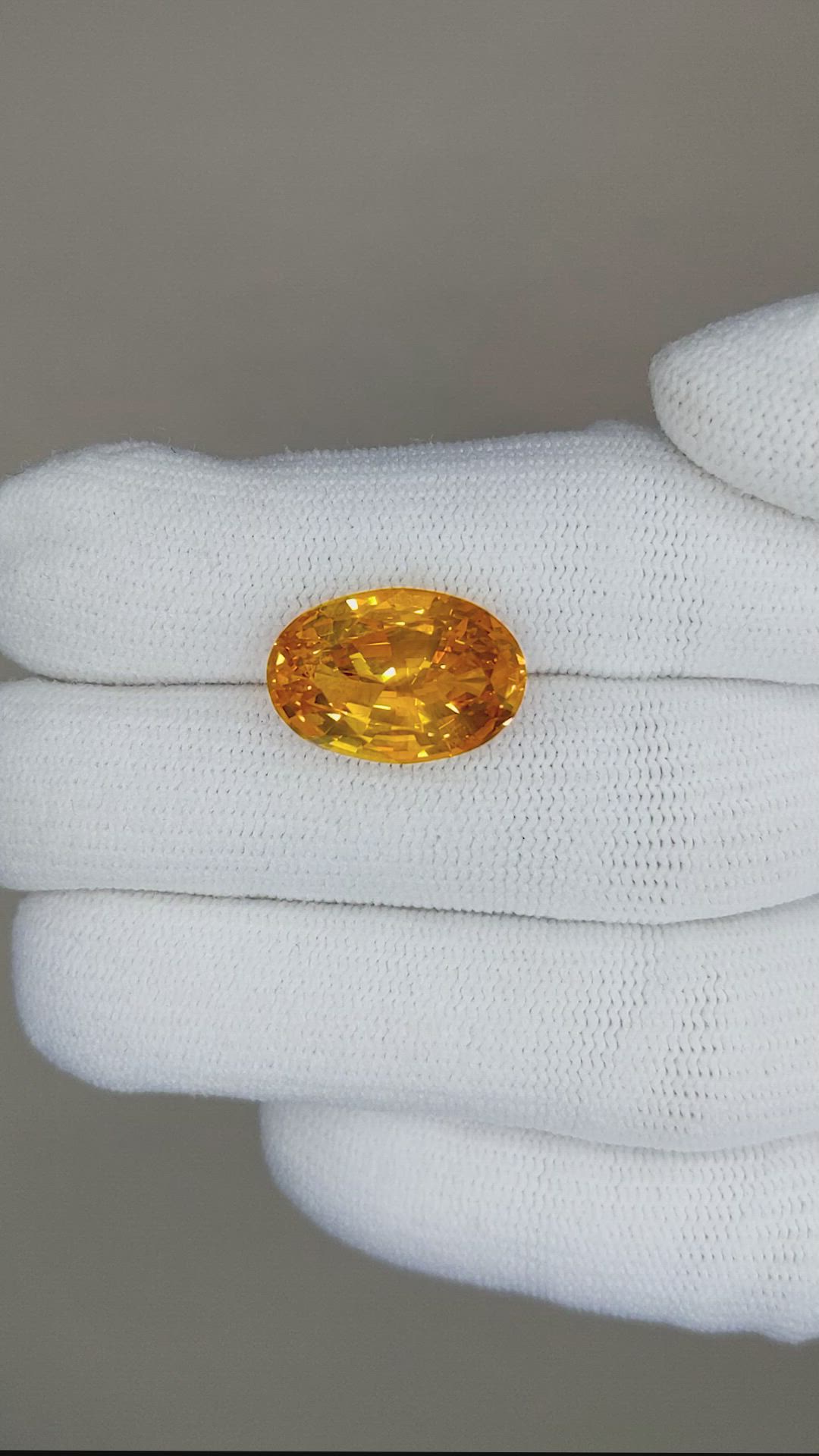 10.90 Ct. Orange Sapphire from Ceylon (Sri Lanka) Size Video