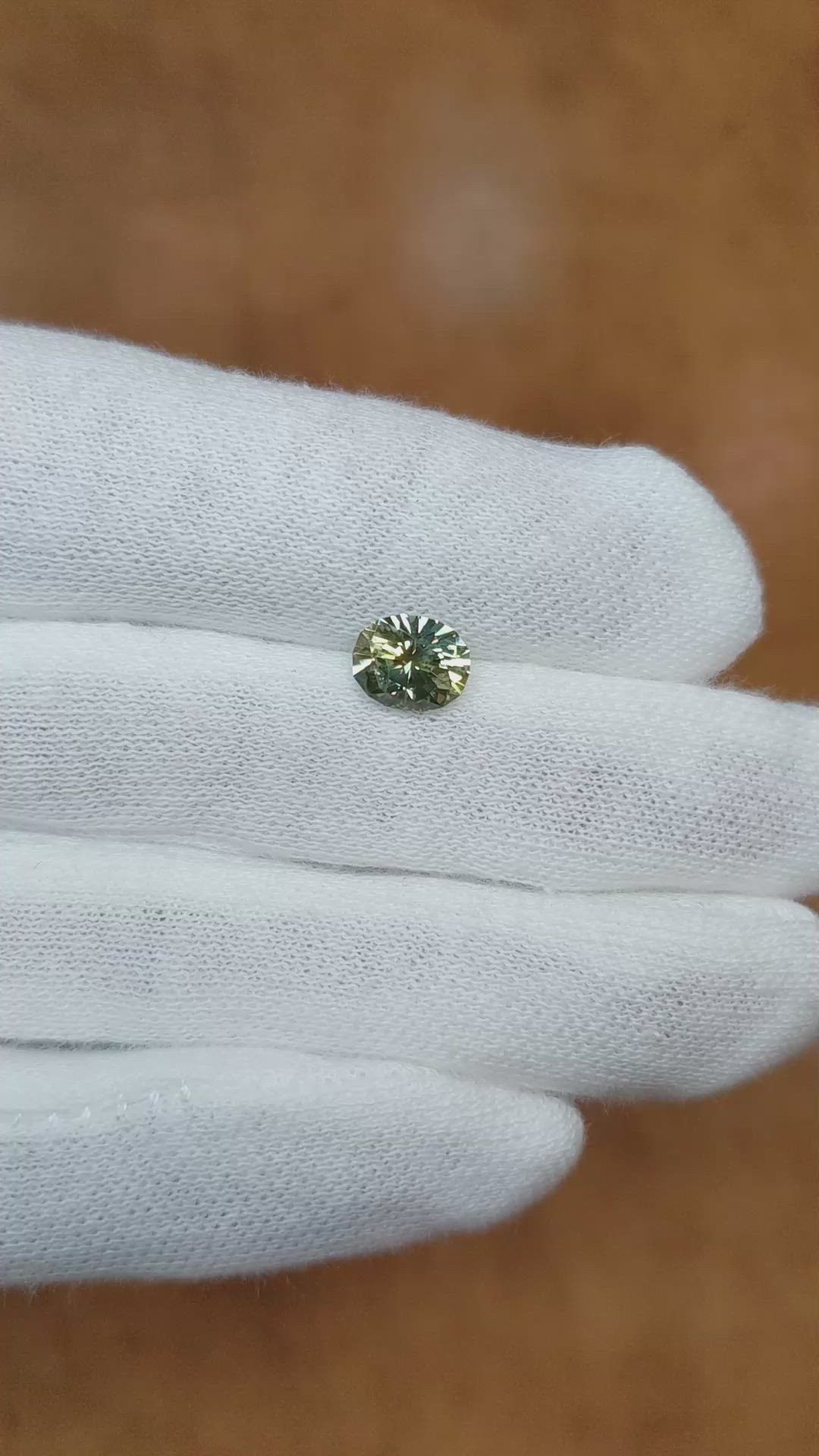 1.56 Ct. Greenish Yellow Sapphire from Montana Size Video