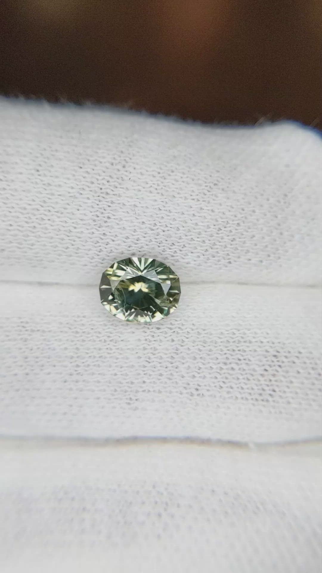 1.56 Ct. Greenish Yellow Sapphire from Montana Size Video