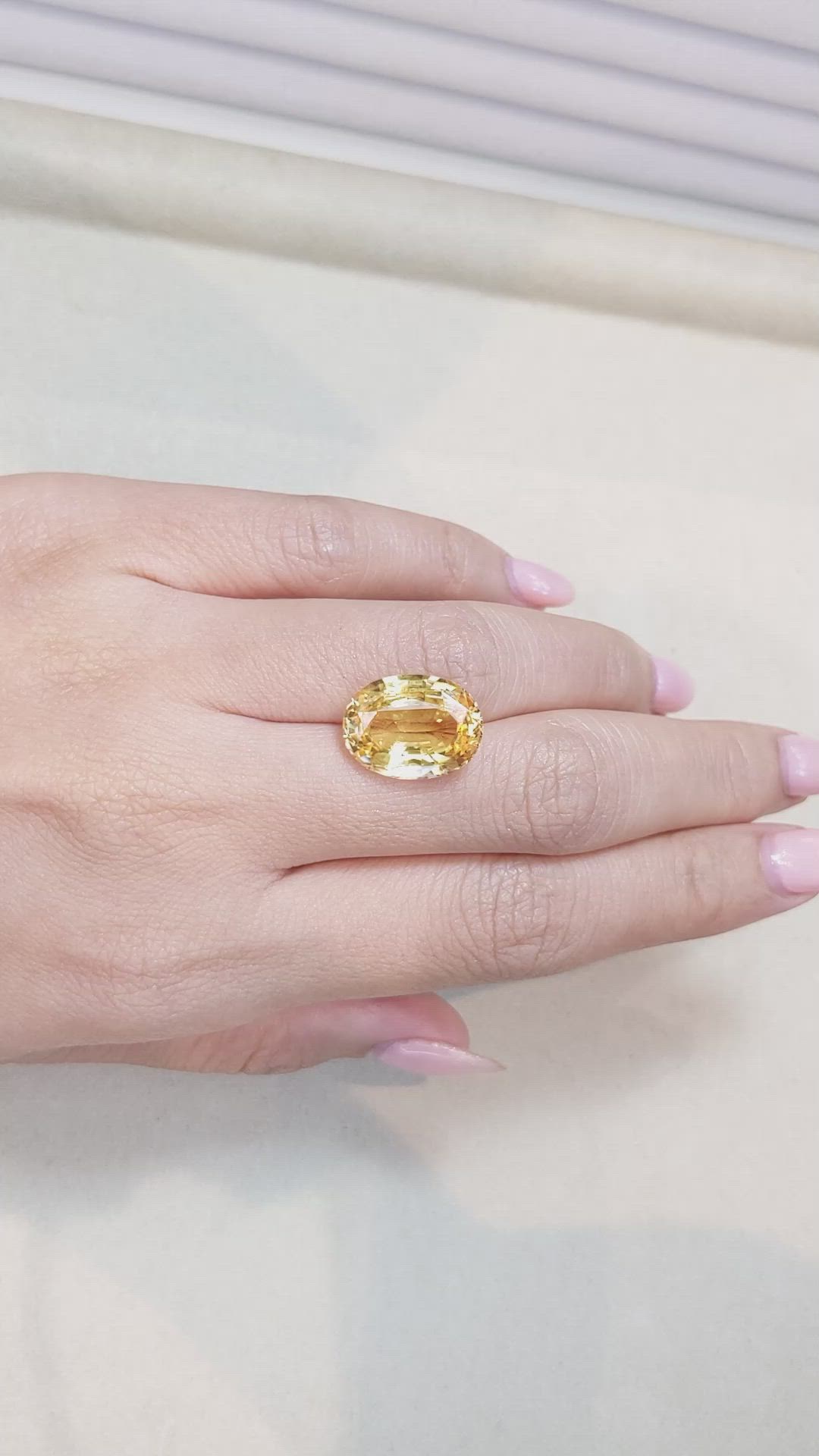 10.47 Ct. Orangish Yellow Sapphire from Ceylon (Sri Lanka) Size Video