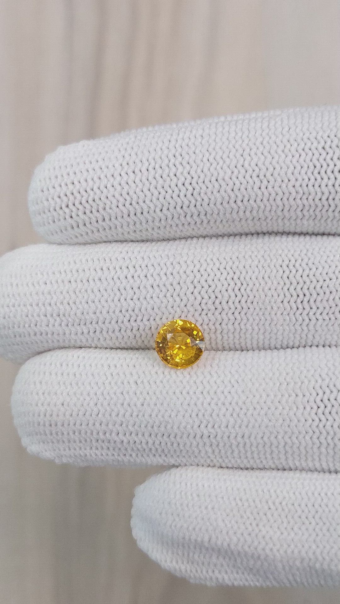 1.57 Ct. Orangish Yellow Sapphire from Ceylon (Sri Lanka) Size Video