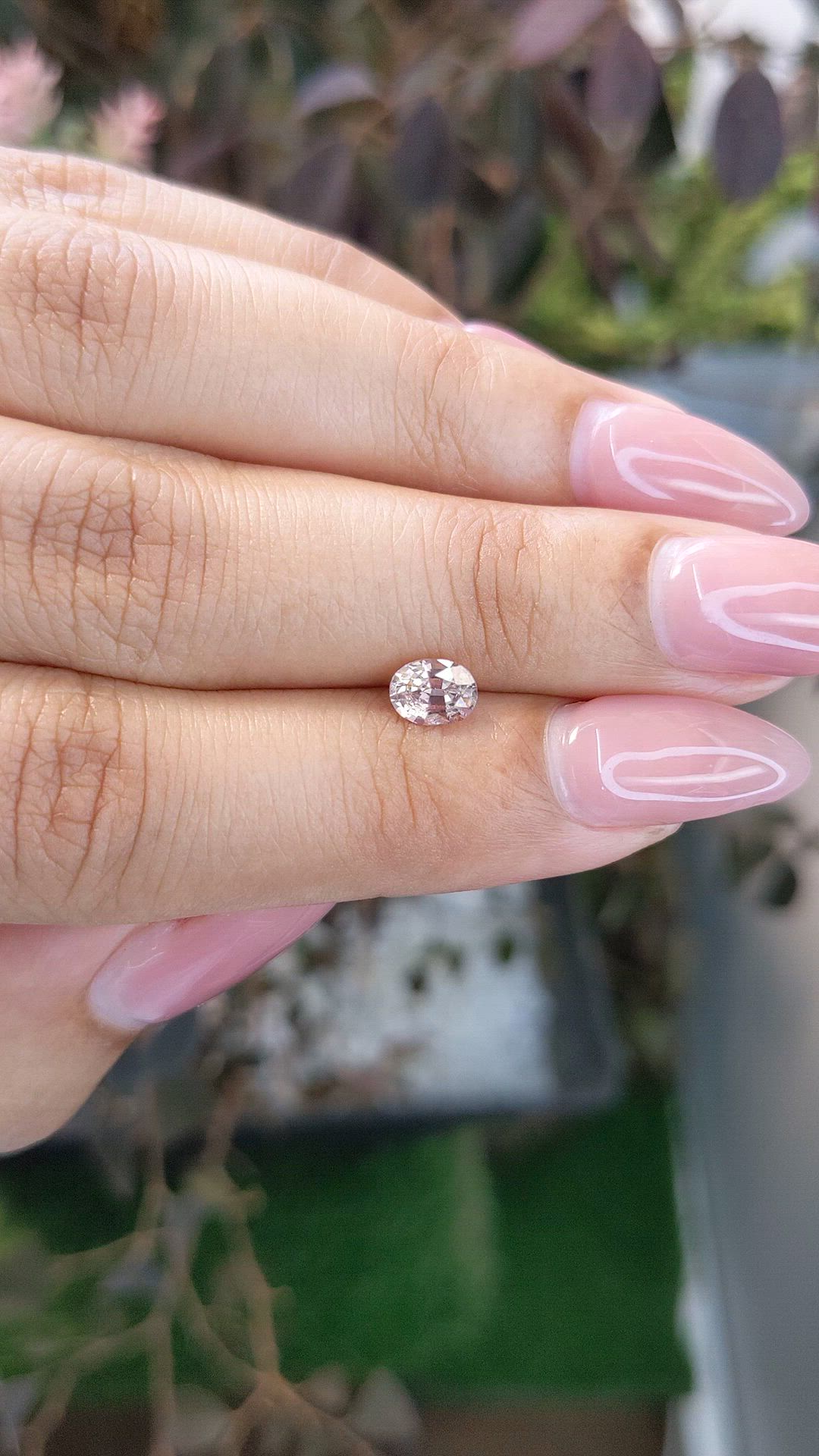0.67 Ct. Peach Sapphire from Ceylon (Sri Lanka) Size Video