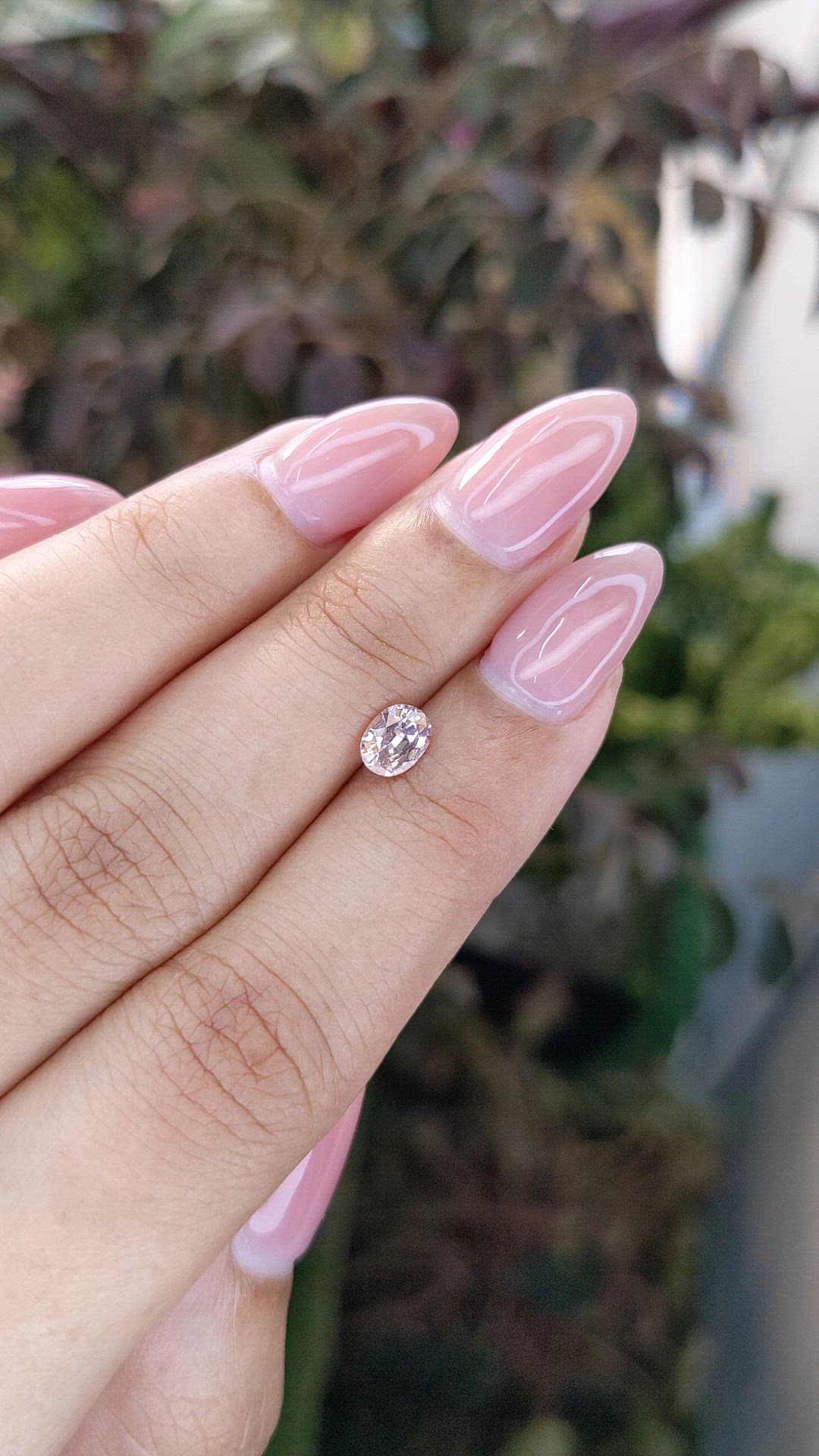 0.67 Ct. Peach Sapphire from Ceylon (Sri Lanka) Size Video