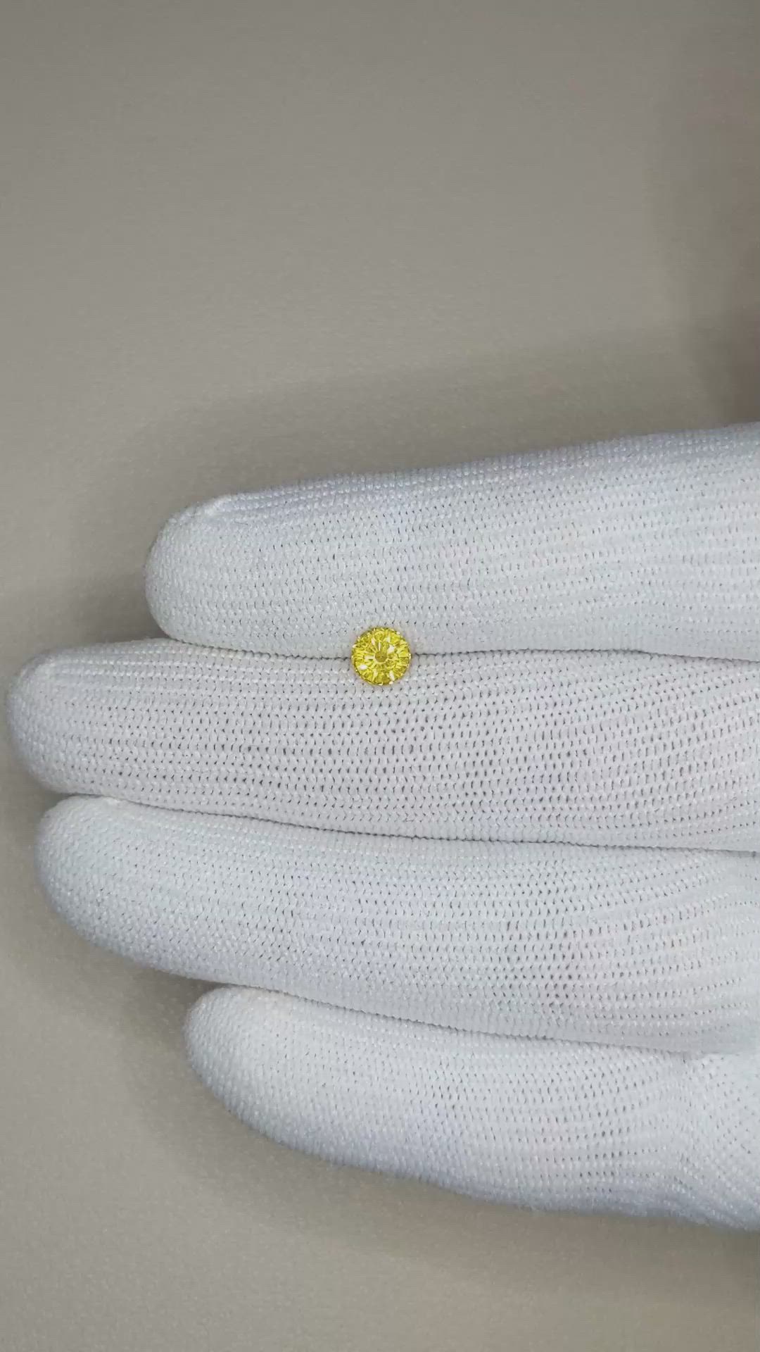 0.68 Ct. Orangish Yellow Sapphire from Ceylon (Sri Lanka) Size Video