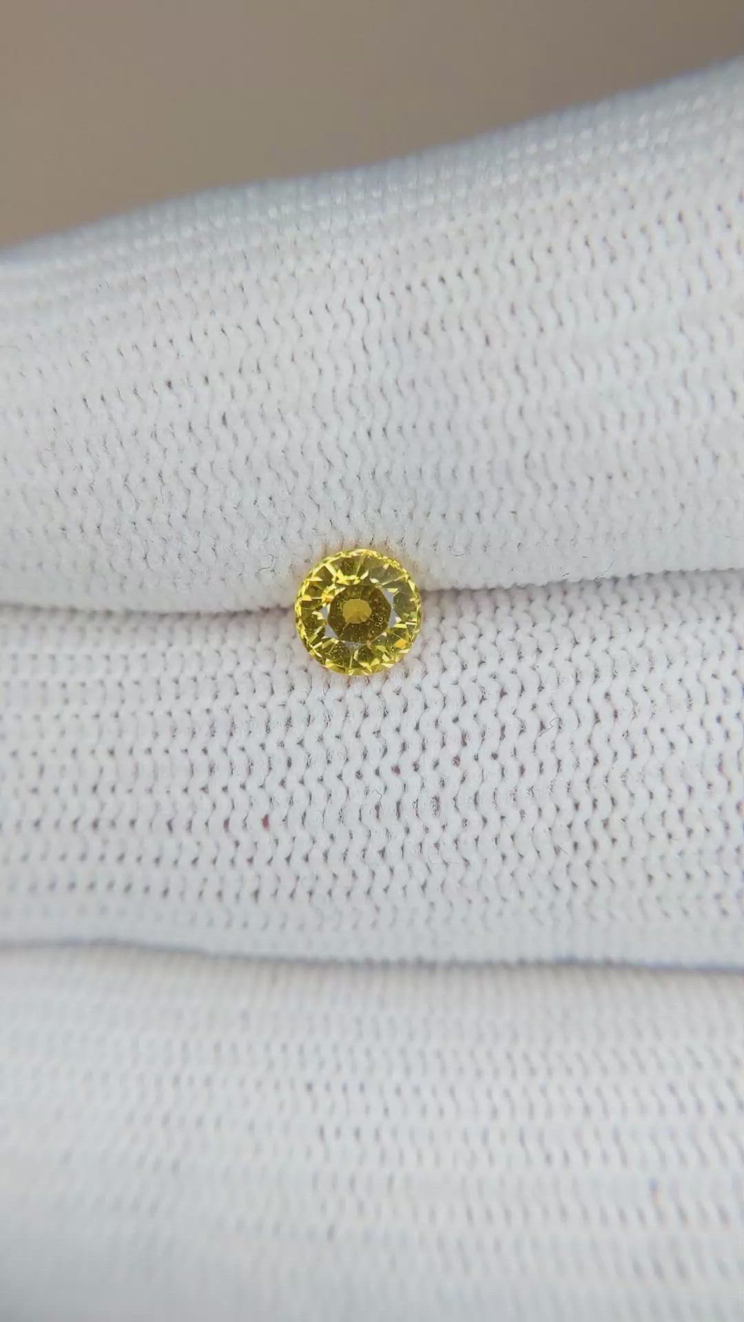 0.68 Ct. Orangish Yellow Sapphire from Ceylon (Sri Lanka) Size Video