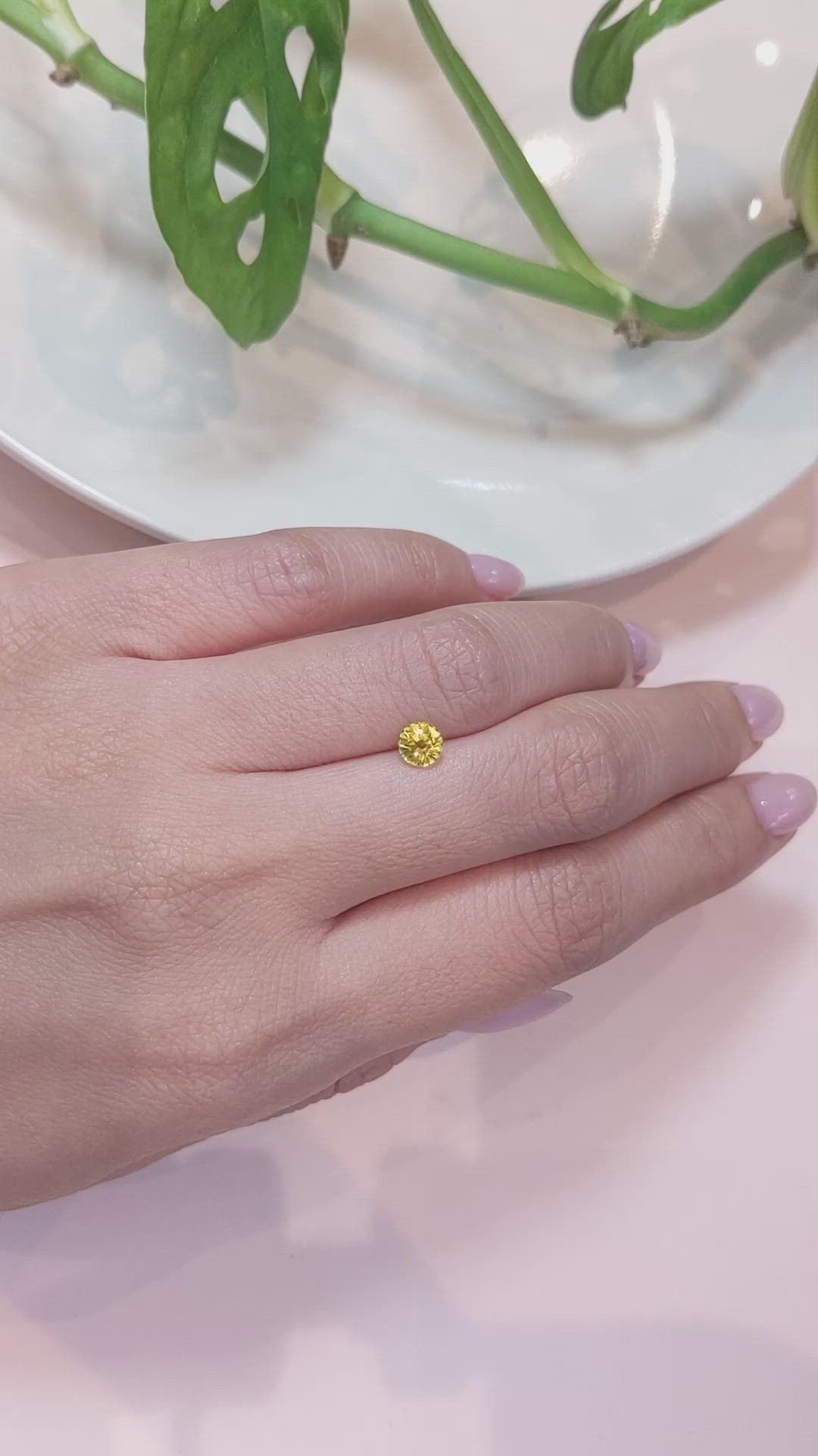 0.68 Ct. Orangish Yellow Sapphire from Ceylon (Sri Lanka) Size Video