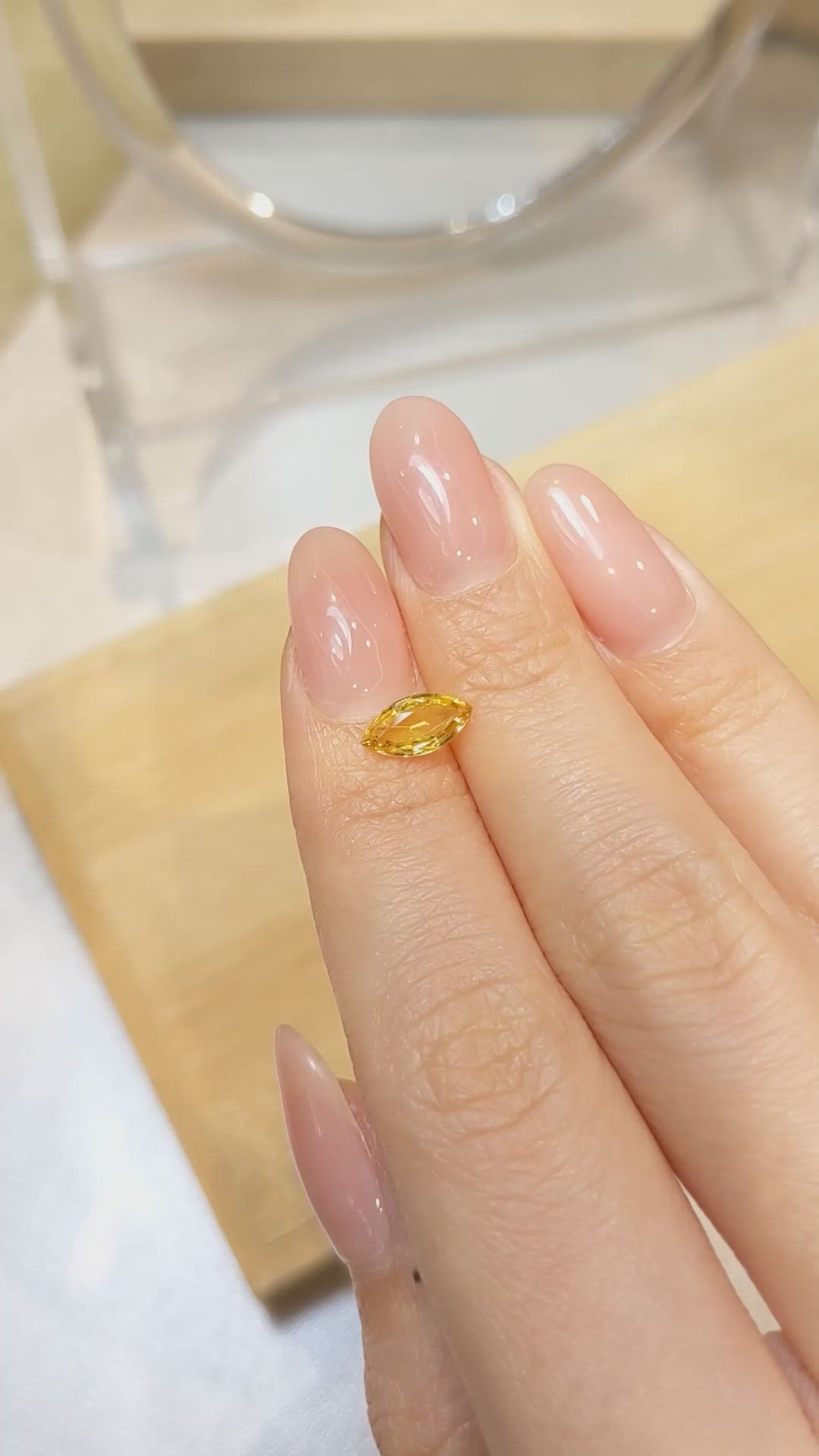 0.98 Ct. Yellowish Orange Sapphire from Ceylon (Sri Lanka) Size Video