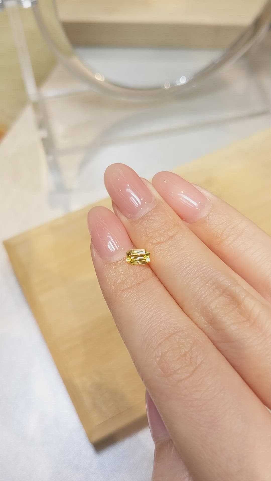 0.66 Ct. Orangish Yellow Sapphire from Ceylon (Sri Lanka) Size Video