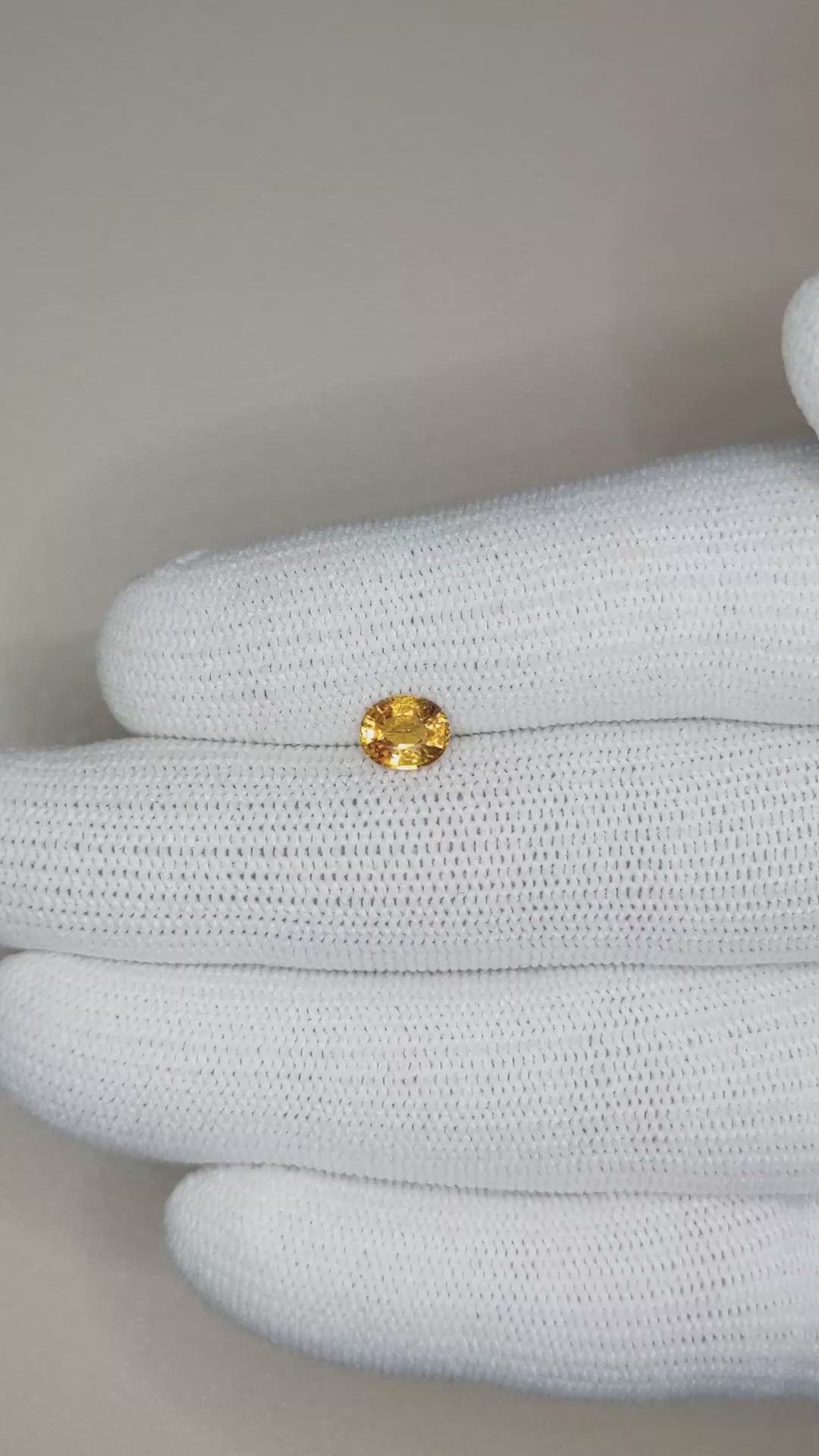 0.87 Ct. Orange Sapphire from Ceylon (Sri Lanka) Size Video