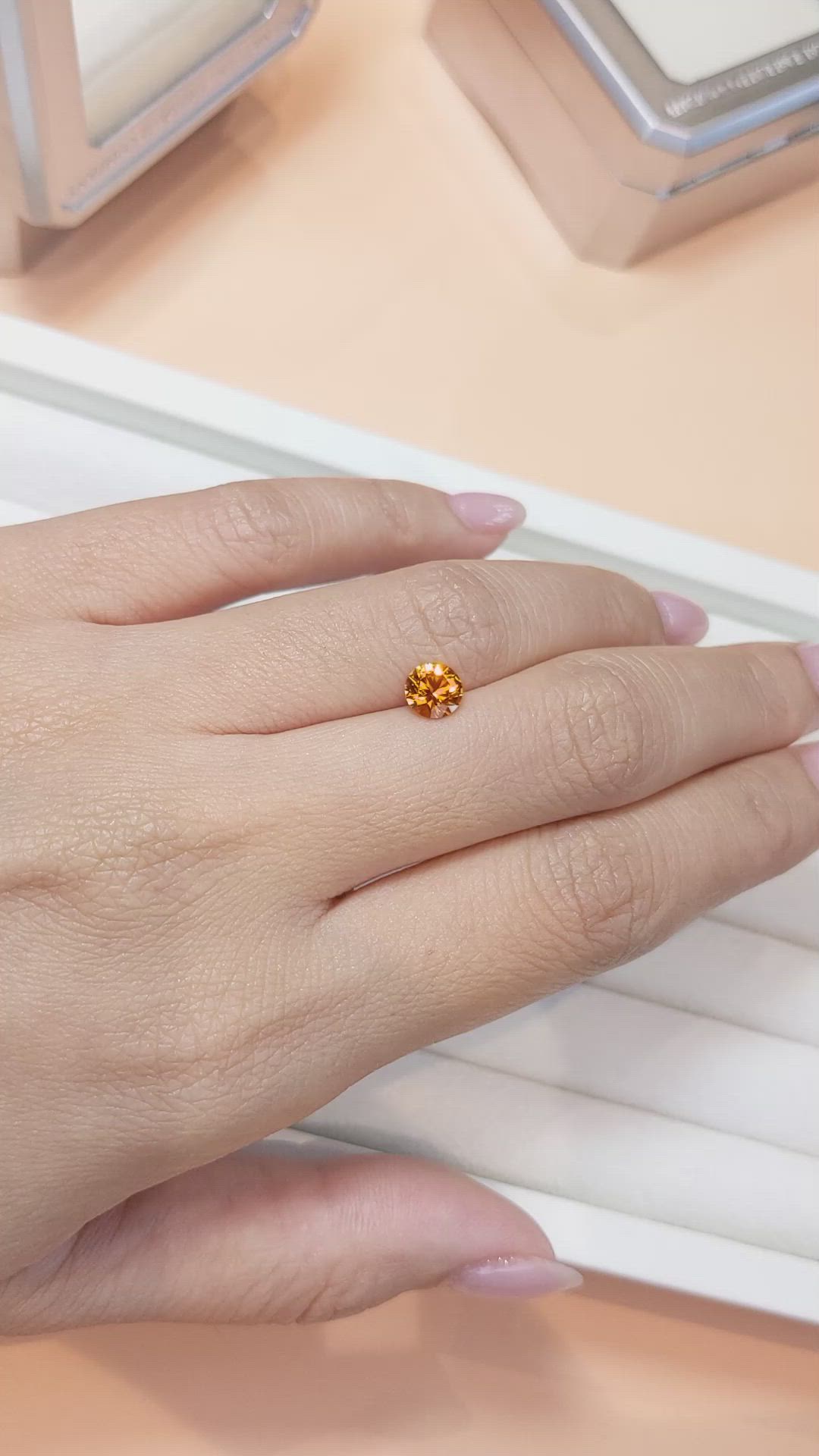 0.88 Ct. Orange Sapphire from Ceylon (Sri Lanka) Size Video