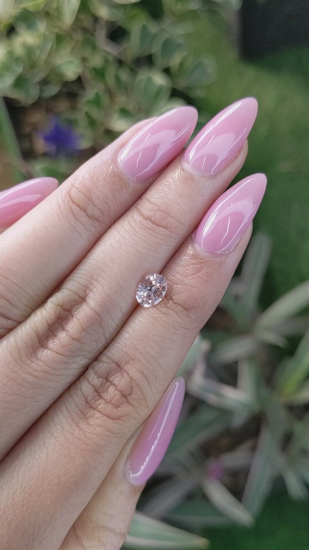 0.96 Ct. Peach Sapphire from Ceylon (Sri Lanka) Size Video
