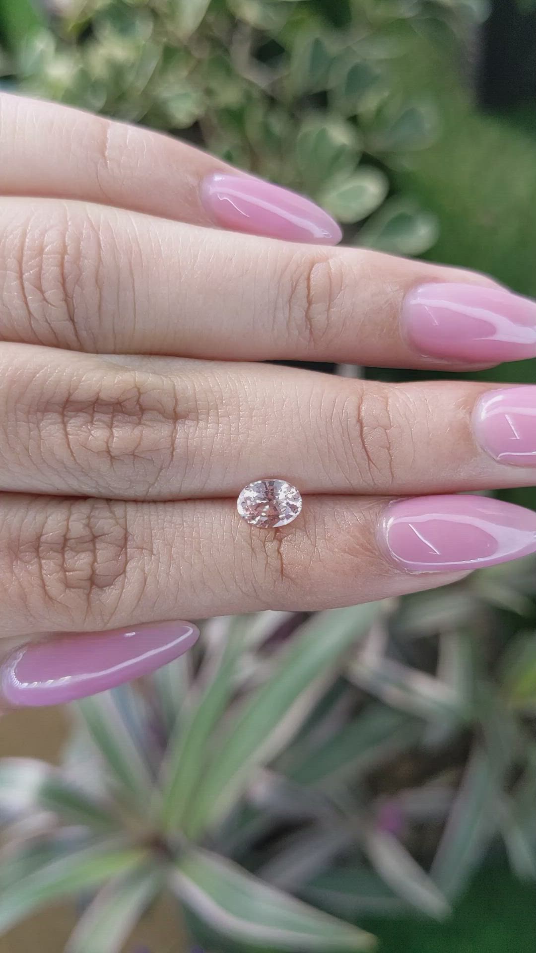 0.96 Ct. Peach Sapphire from Ceylon (Sri Lanka) Size Video