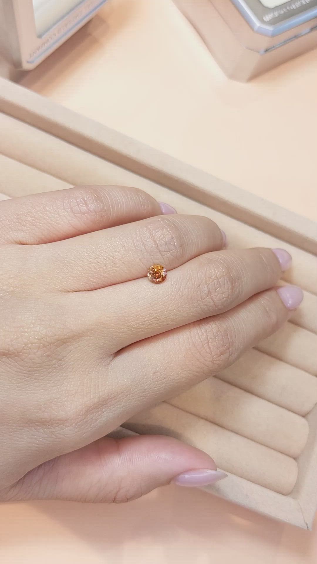 0.71 Ct. Orange Sapphire from Montana Size Video