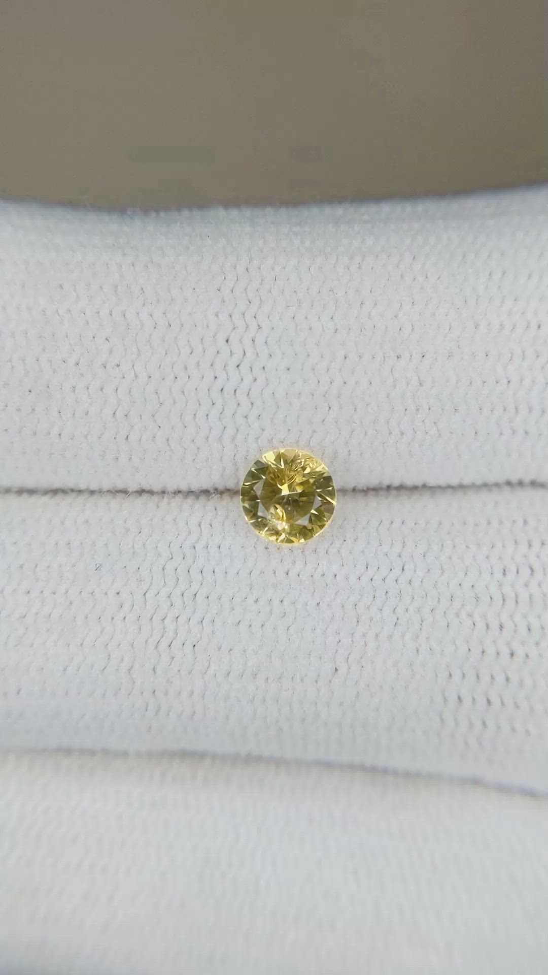 0.55 Ct. Yellow Sapphire from Montana Size Video