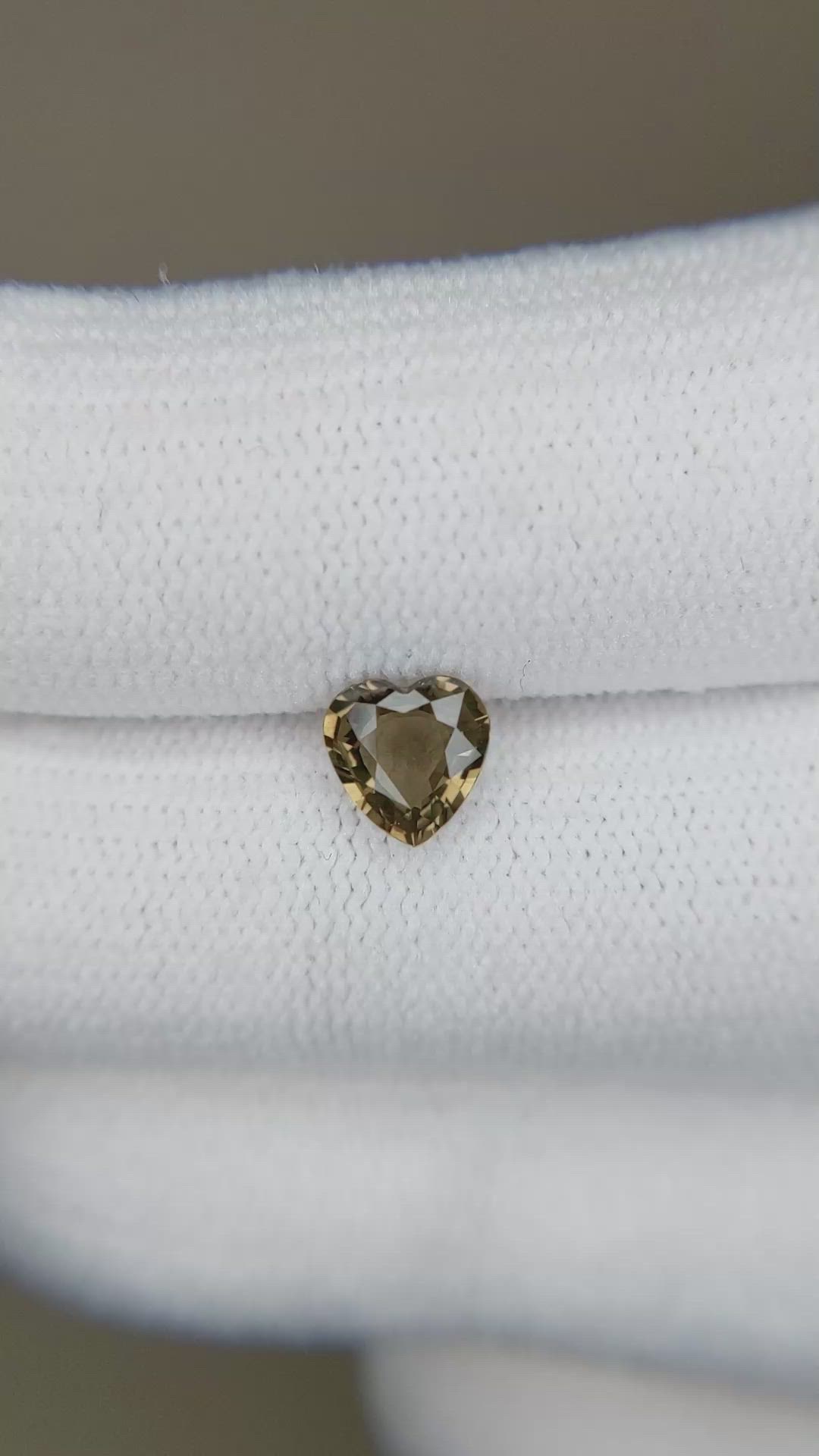 0.76 Ct. Greenish Brown Sapphire from Ceylon (Sri Lanka) Size Video