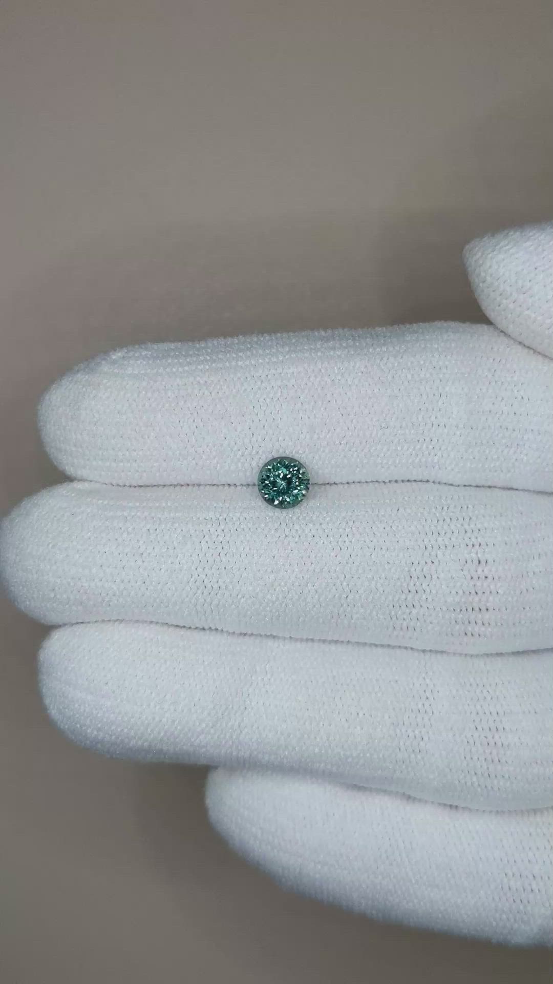 0.66 Ct. Bluish Green Sapphire from Montana Size Video