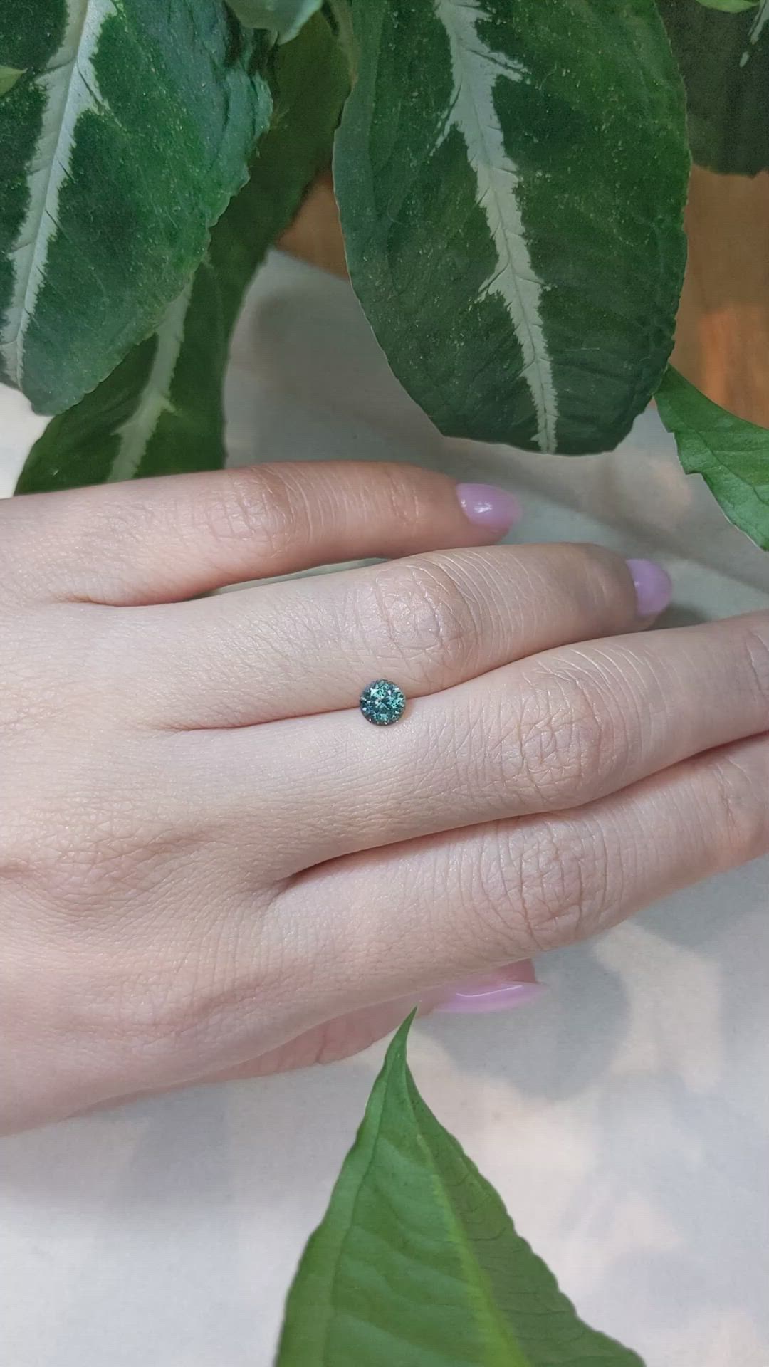 0.66 Ct. Bluish Green Sapphire from Montana Size Video
