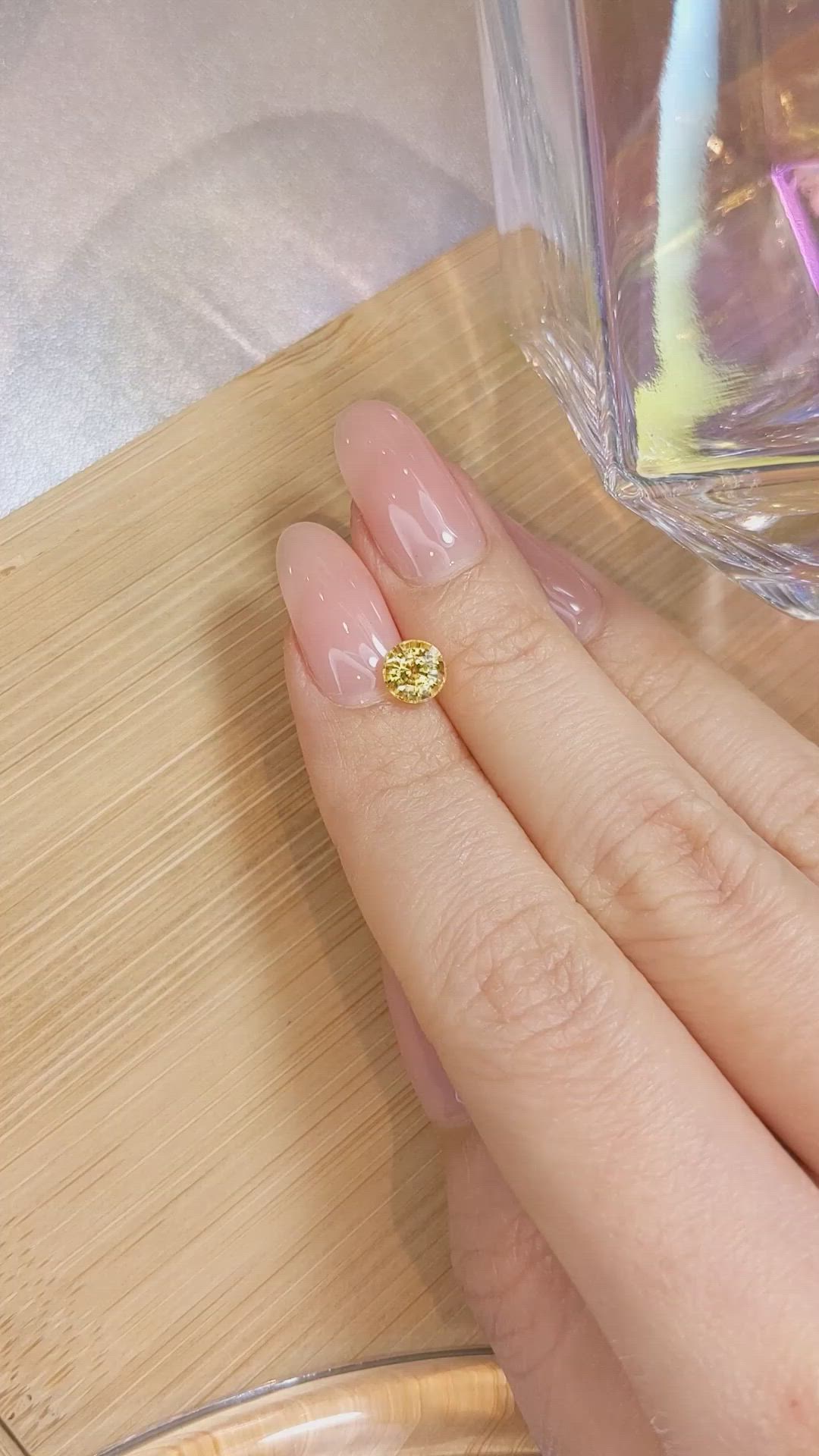 1.35 Ct. Orangish Yellow Sapphire from Ceylon (Sri Lanka) Size Video