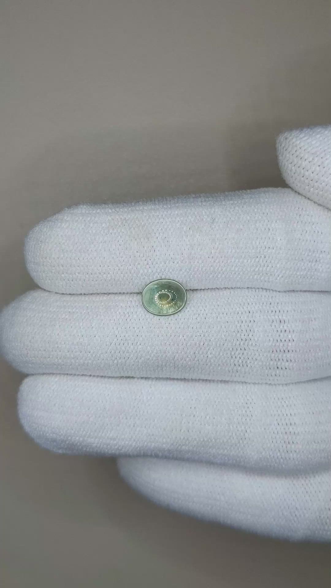 0.87 Ct. Yellowish Green Cabochon Sapphire from Montana Size Video