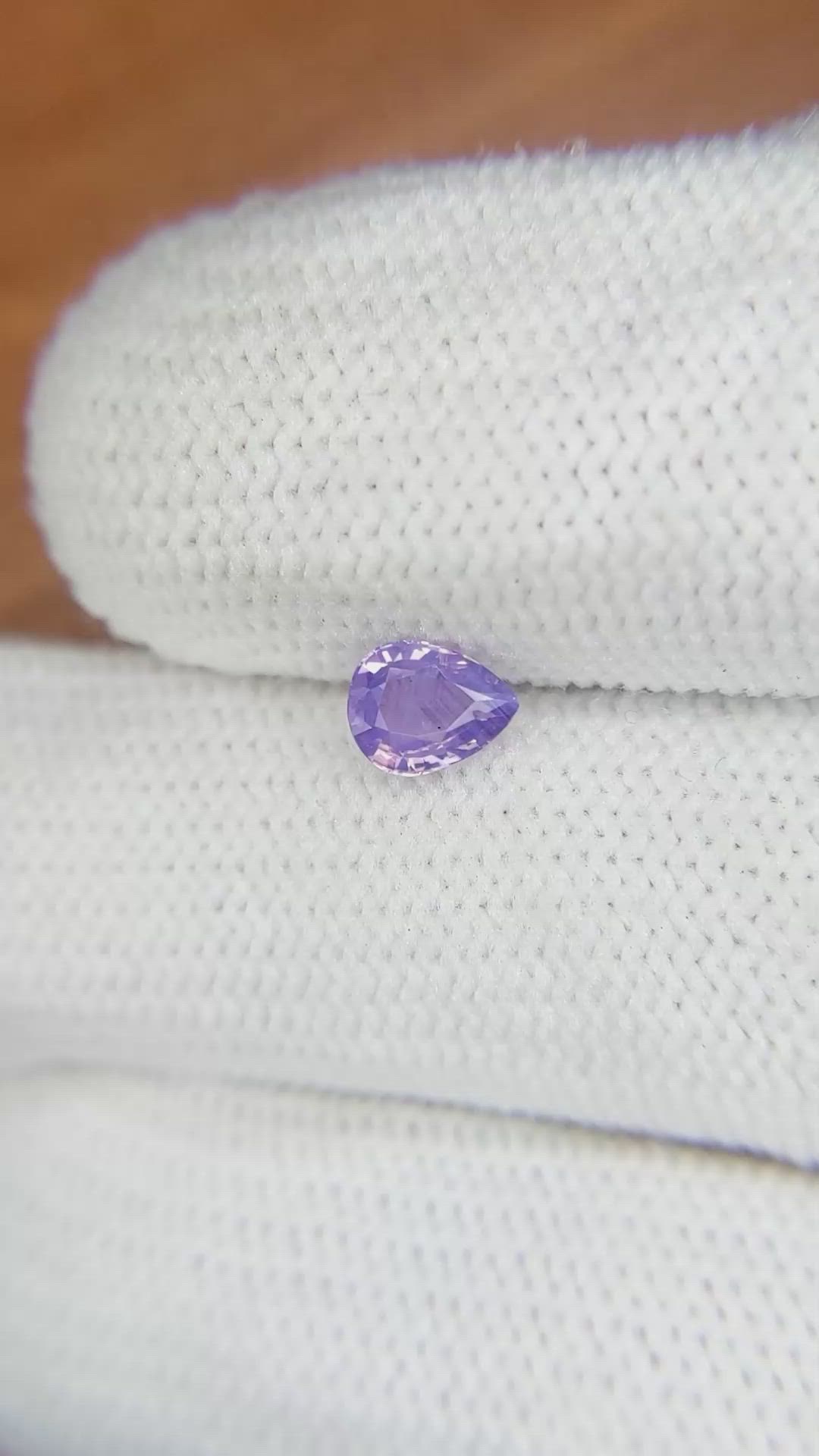 0.61 Ct. Pinkish Purple Sapphire from Ceylon (Sri Lanka) Size Video