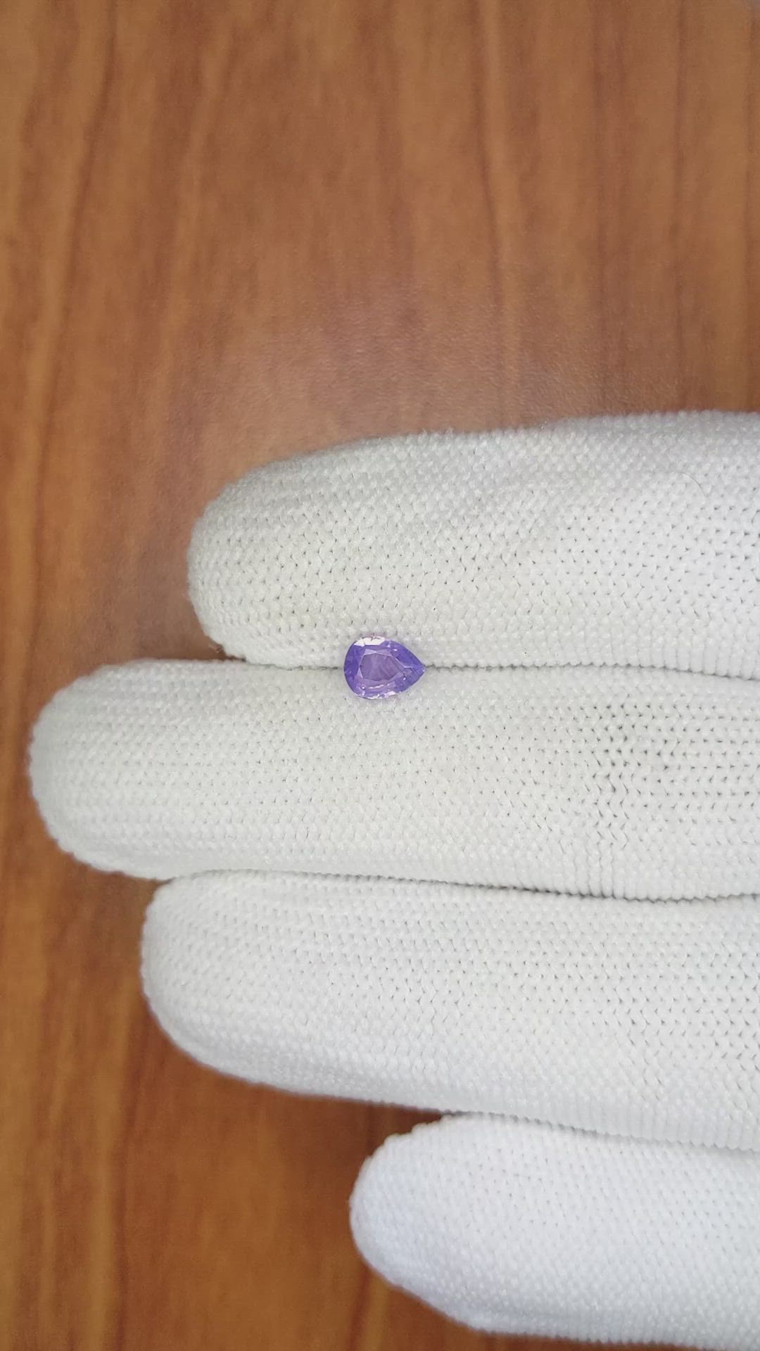 0.61 Ct. Pinkish Purple Sapphire from Ceylon (Sri Lanka) Size Video