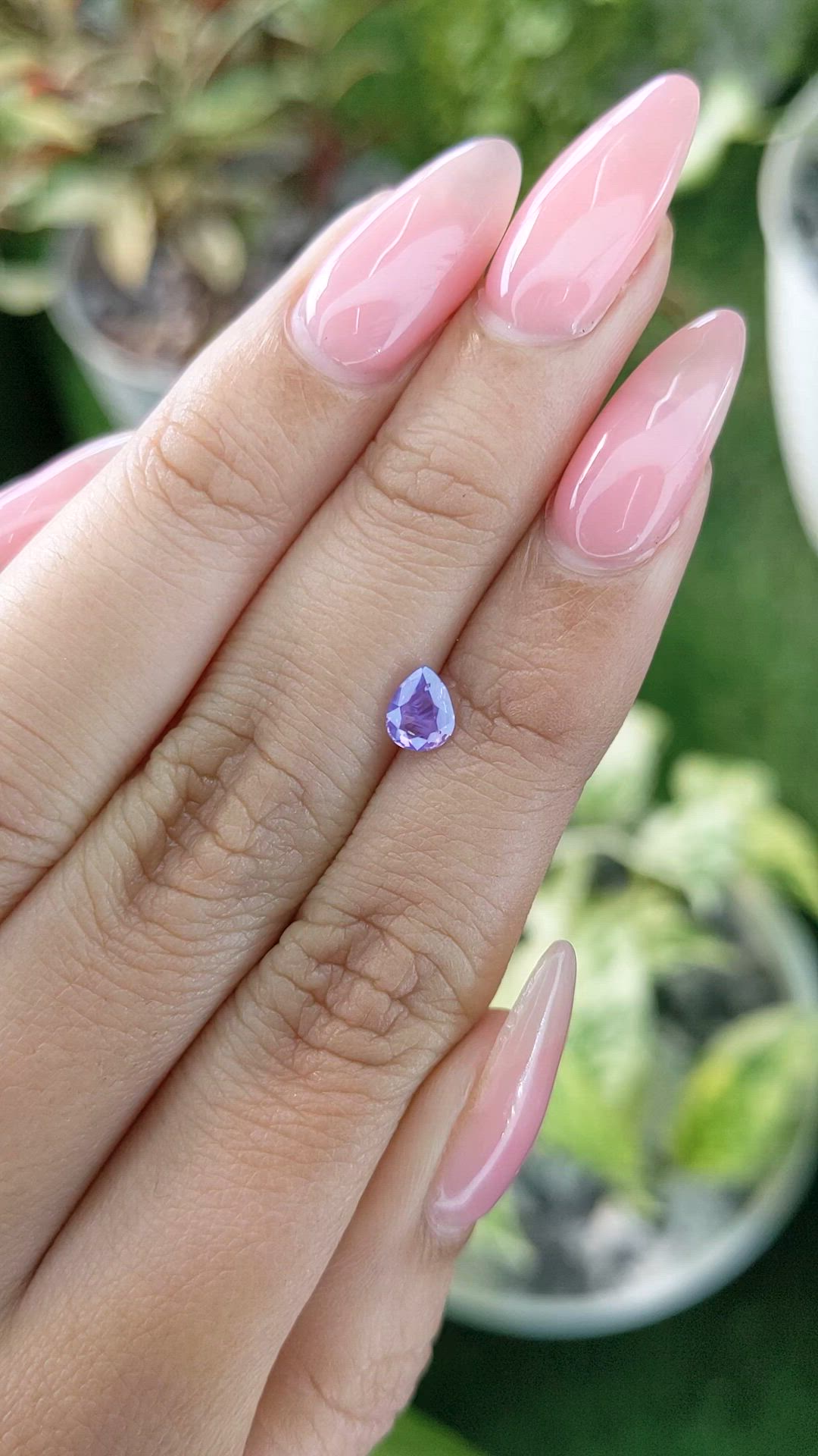 0.61 Ct. Pinkish Purple Sapphire from Ceylon (Sri Lanka) Size Video