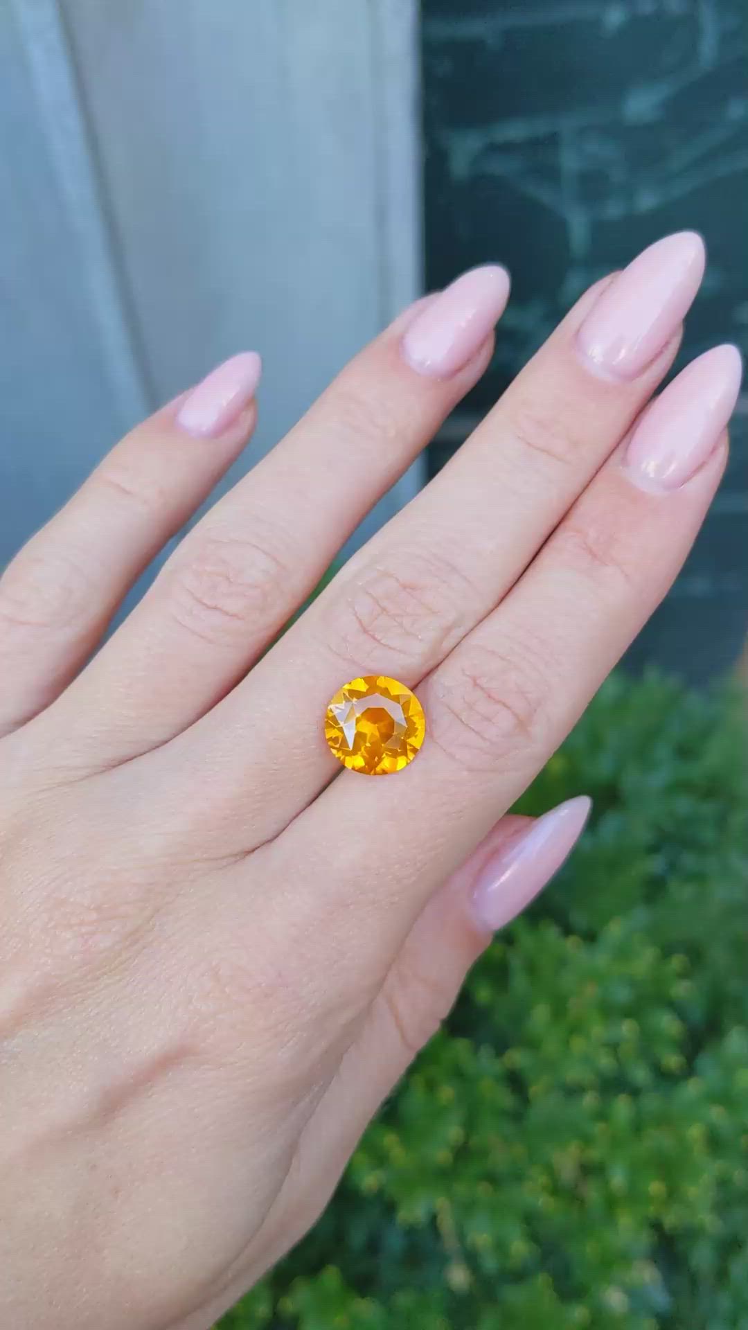 5.63 Ct. Orange Sapphire from Ceylon (Sri Lanka) Size Video